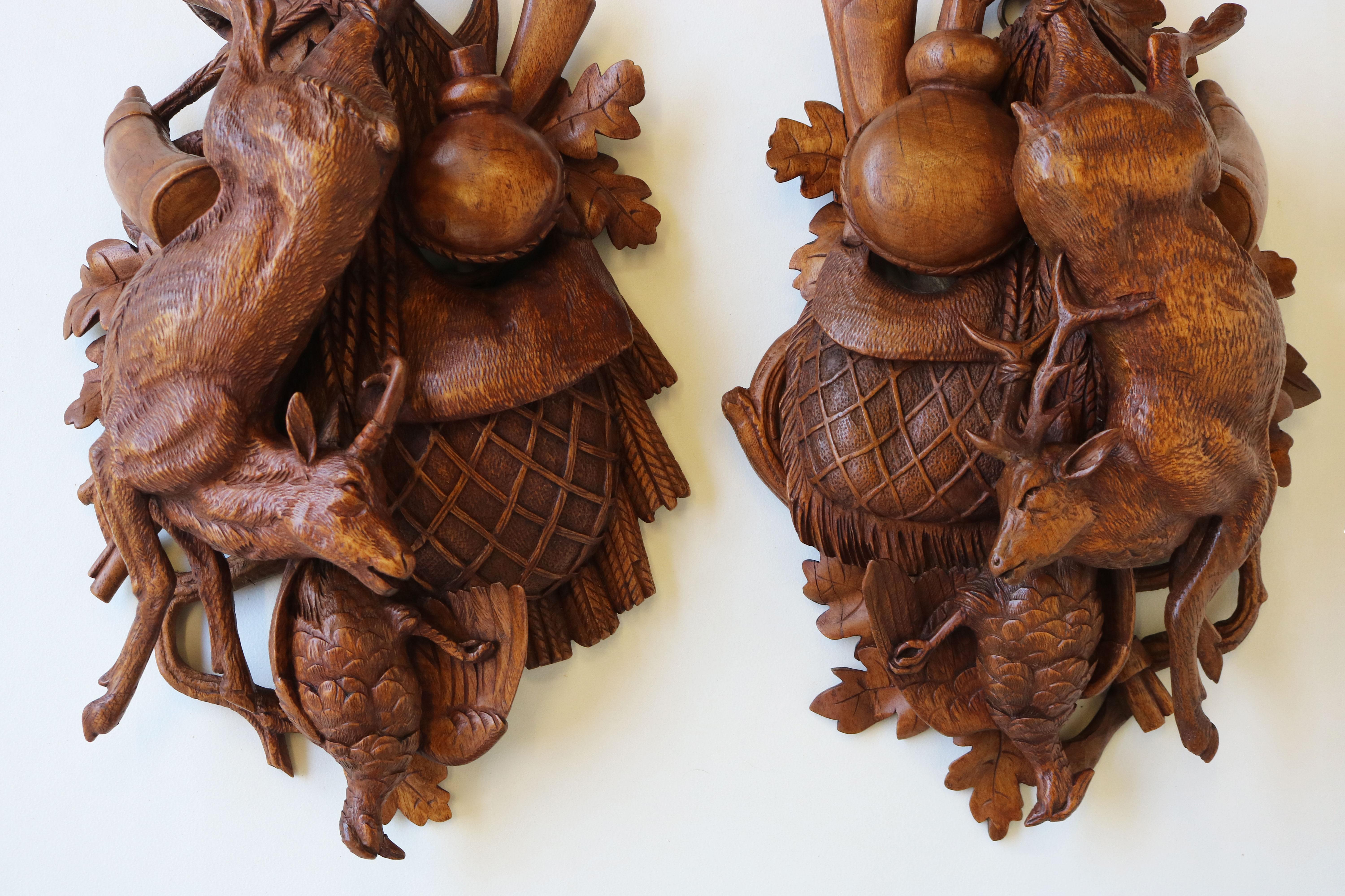 Stunning craftsmanship! This pair of 19th century Black Forest hunting Trophy plaques from Brienz Switzerland. 
Fully carved from solid wood these look amazing on your wall and are just a joy to look at. 
Marvelous pair for any Black Forest