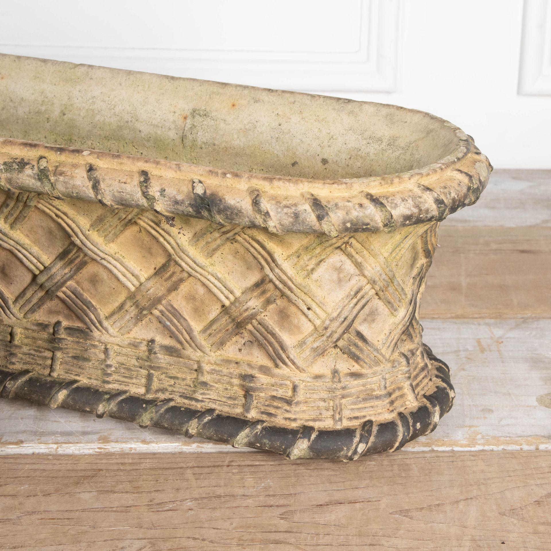 Wonderful and rare, pair of mid 19th Century terracotta basket weave decorated window boxes or garden planters, both nicely weathered and in very good condition.
Although not stamped these planters are attributed to James Pulham and Son, the