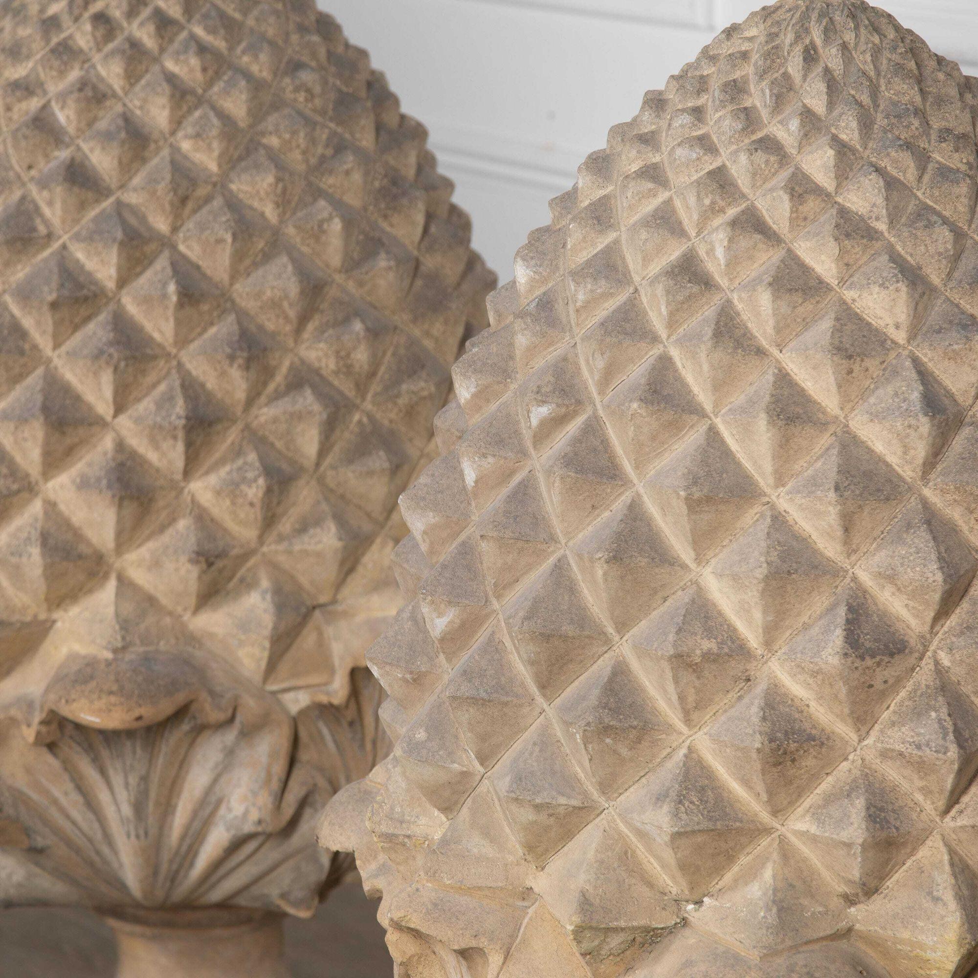 Stunning and very large-scale pair of 19th Century terracotta pineapple finials by J M Blashfield, one stamped.
Pineapples used decoratively and architecturally in the 18th and 19th Centuries were a show of hospitality, wealth and prestige.
John
