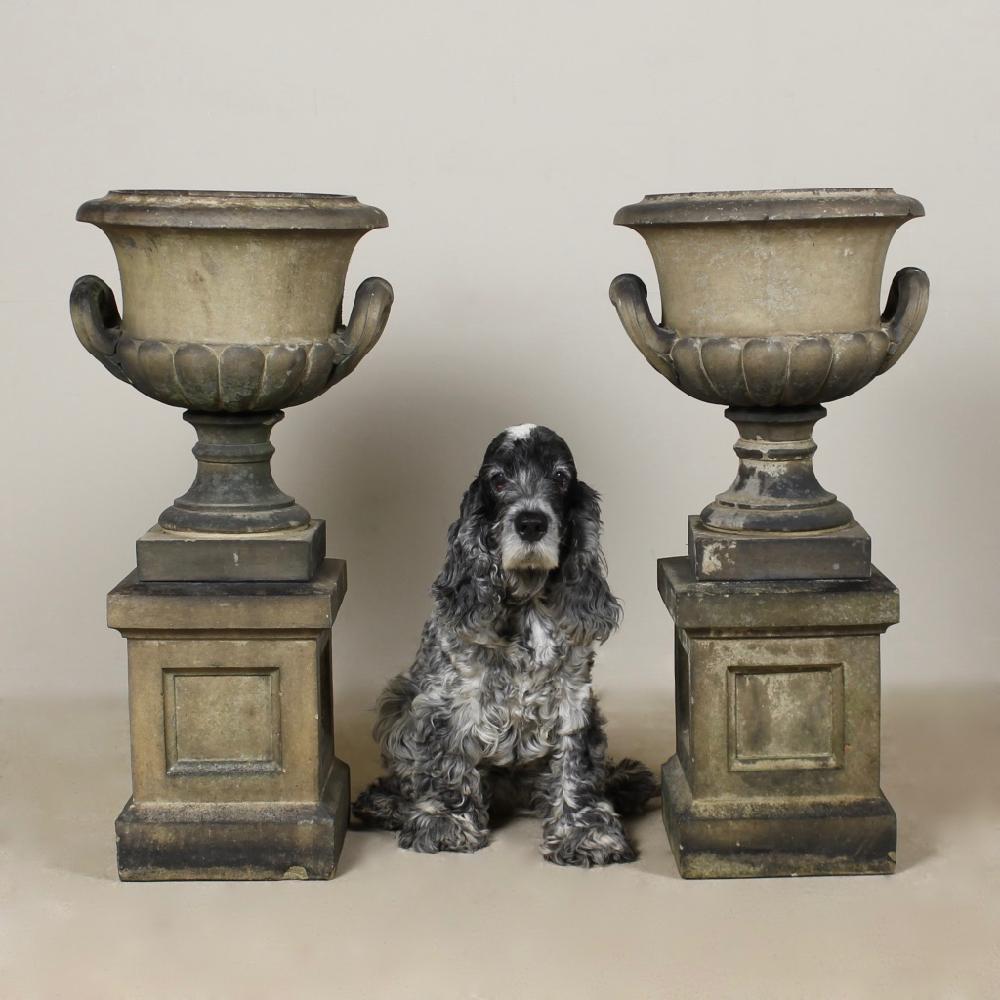 A rare pair of late 19th century, James Pulham, terracotta garden urns, model number 2 the ' Inverness Vase' from their 1915 catalogue.
In generally good condition, one urn has an old repaired crack, chips and nibbles commensurate with age and