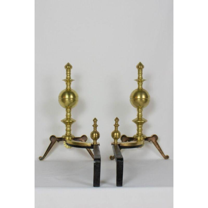 Pair of 19th century turned brass andirons. Eastlake style. Solid brass and iron. American C. 1870. Hand polished and restored.

Dimensions:
Height: 18?
Width: 11?
Depth: 22?