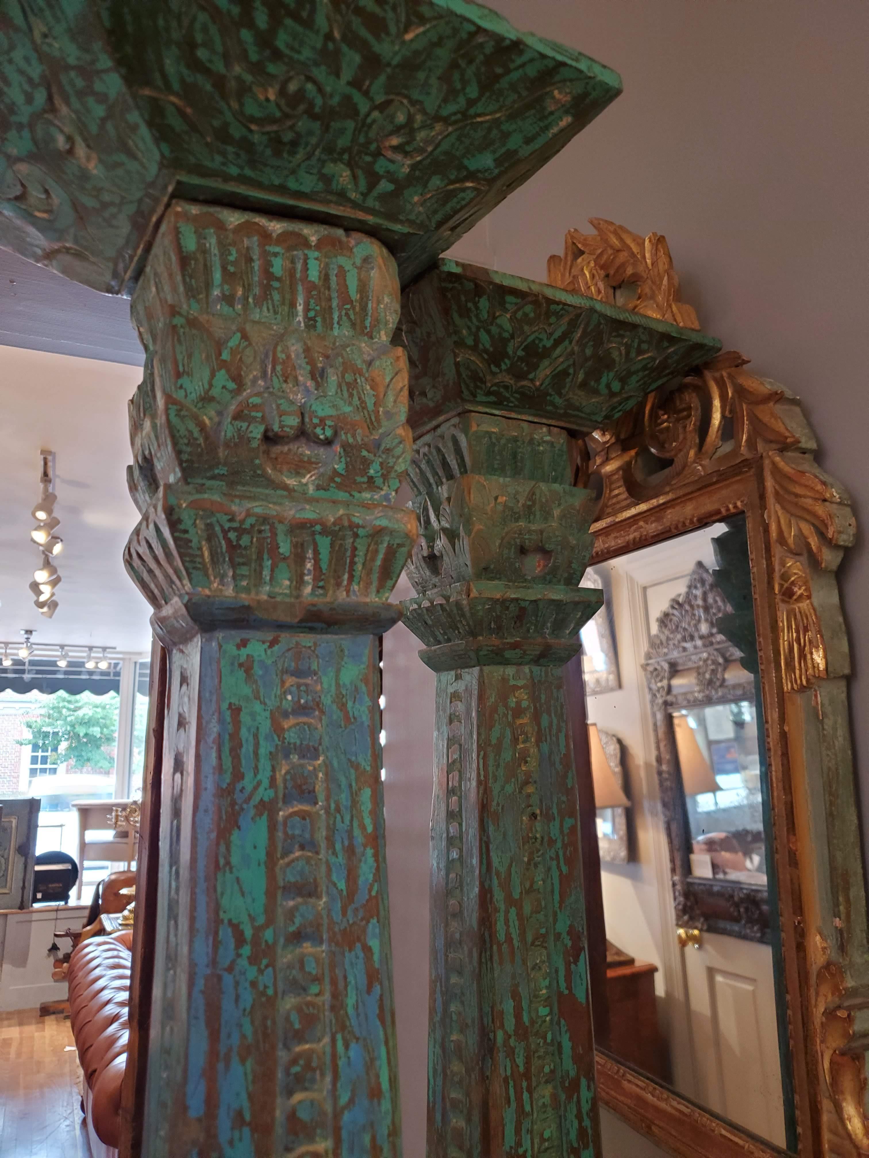 Made of teak, these unique 19th century hand carved columns have an intricate Indonesian decoration with the original blue and green painted finish. They are sure to add to bit of interest to your interior design project.
Java, circa