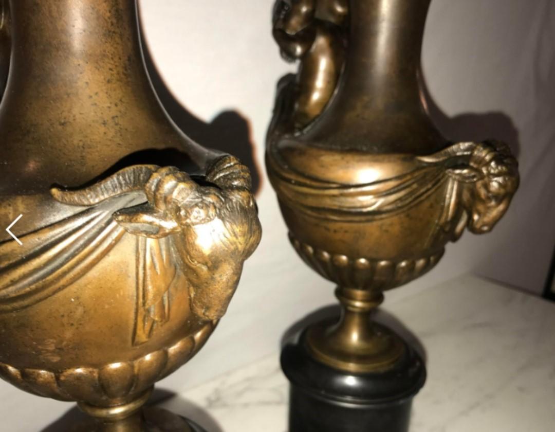 Pair of 19th Century Urns on Marble Stands Bearing Cherubs and Rams Heads For Sale 2