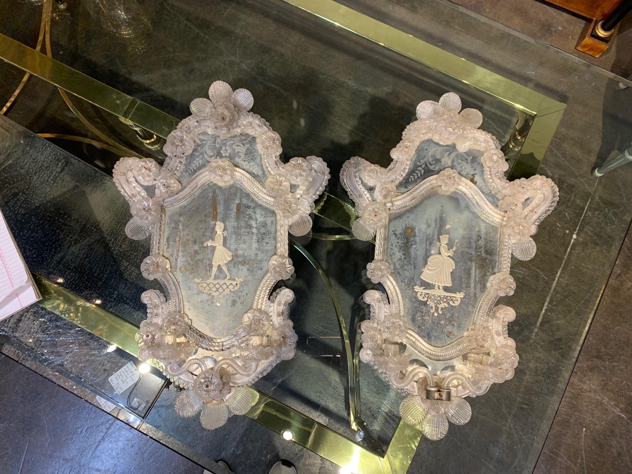 Beautiful pair of 19th century Venetian etched mirror sconces. Decorative flowers and etched images of fine ladies, possibly a mother and a daughter make this extra special!