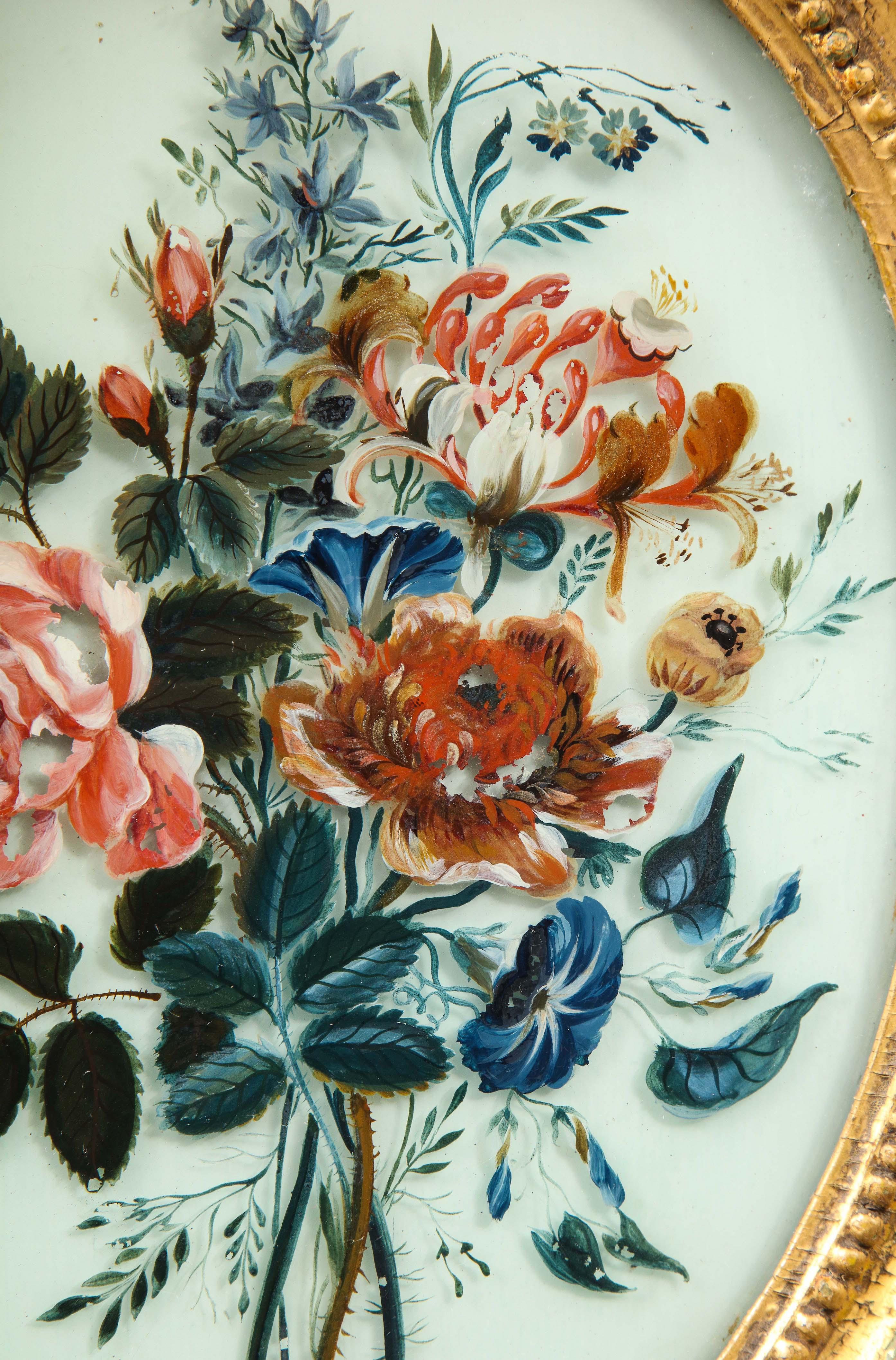 Hand-Painted Pair of 19th Century Verre Églomisé Oval Paintings of Floral Bouquets