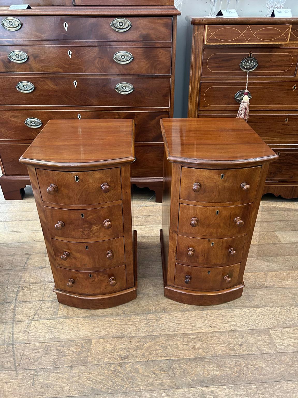 A Pair of 19th Century Victorian Walnut Bedside Tables with four fitted drawers and turned bun handles x2.

Circa: 1860

Dimensions:
Height:  27 inches – 69 cms
Width: 14.5 inches – 37 cms
Depth:  17.75 inches – 45 cms

Reference: CP2302