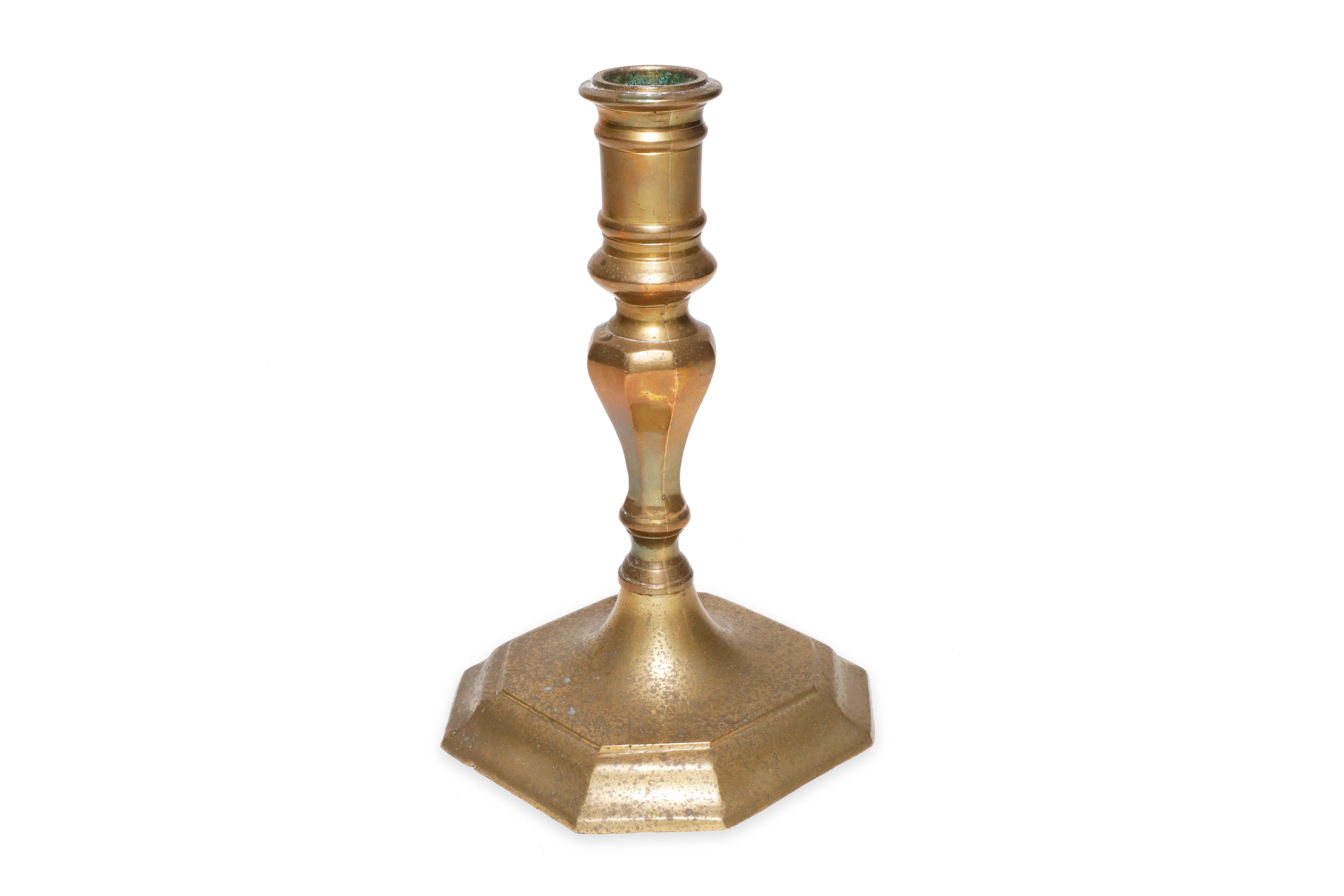 Pair of Victorian candle holders from the 19th century. Authentic English solid brass candlesticks holder with age patina intact (unpolished.)

Property from esteemed interior designer Juan Montoya. Juan Montoya is one of the most acclaimed and