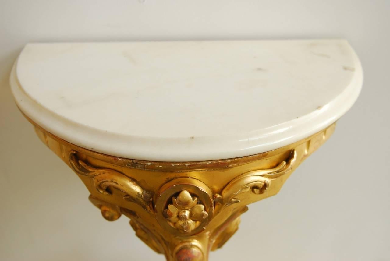 Hand-Carved Pair of 19th Century Wall-Mounted Gilt and Marble Consoles