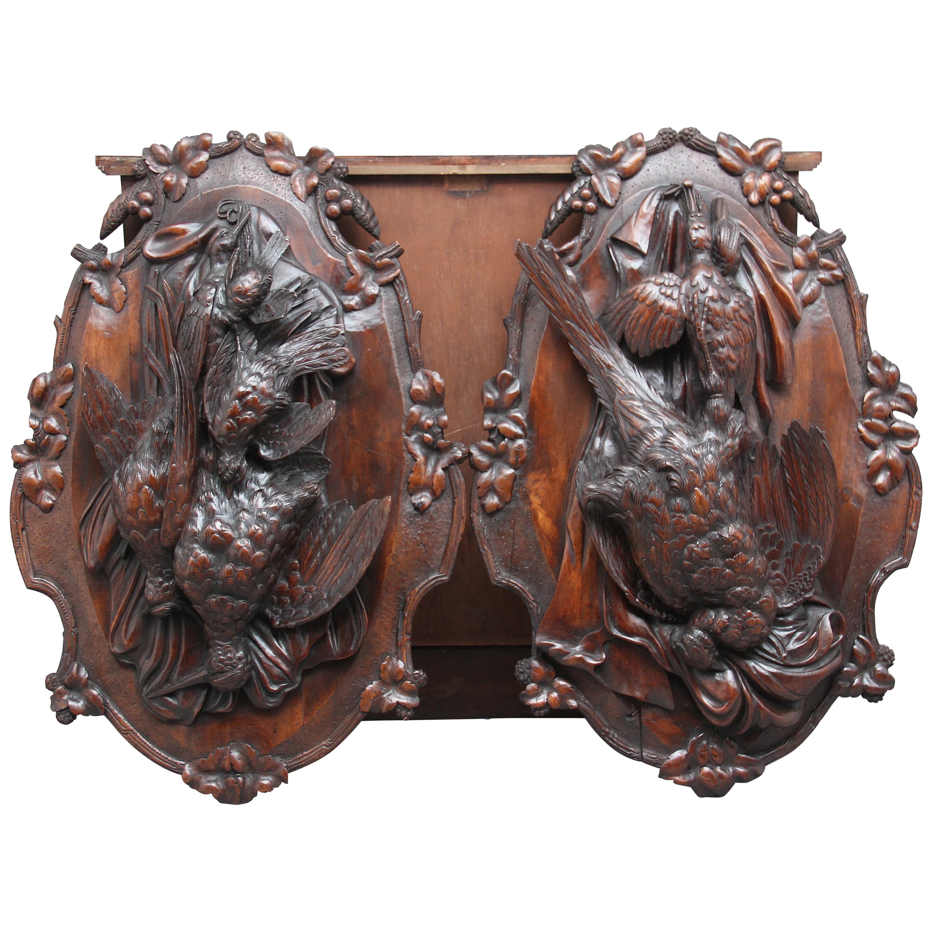 Pair of 19th Century Walnut Black Forest Wall Plaques