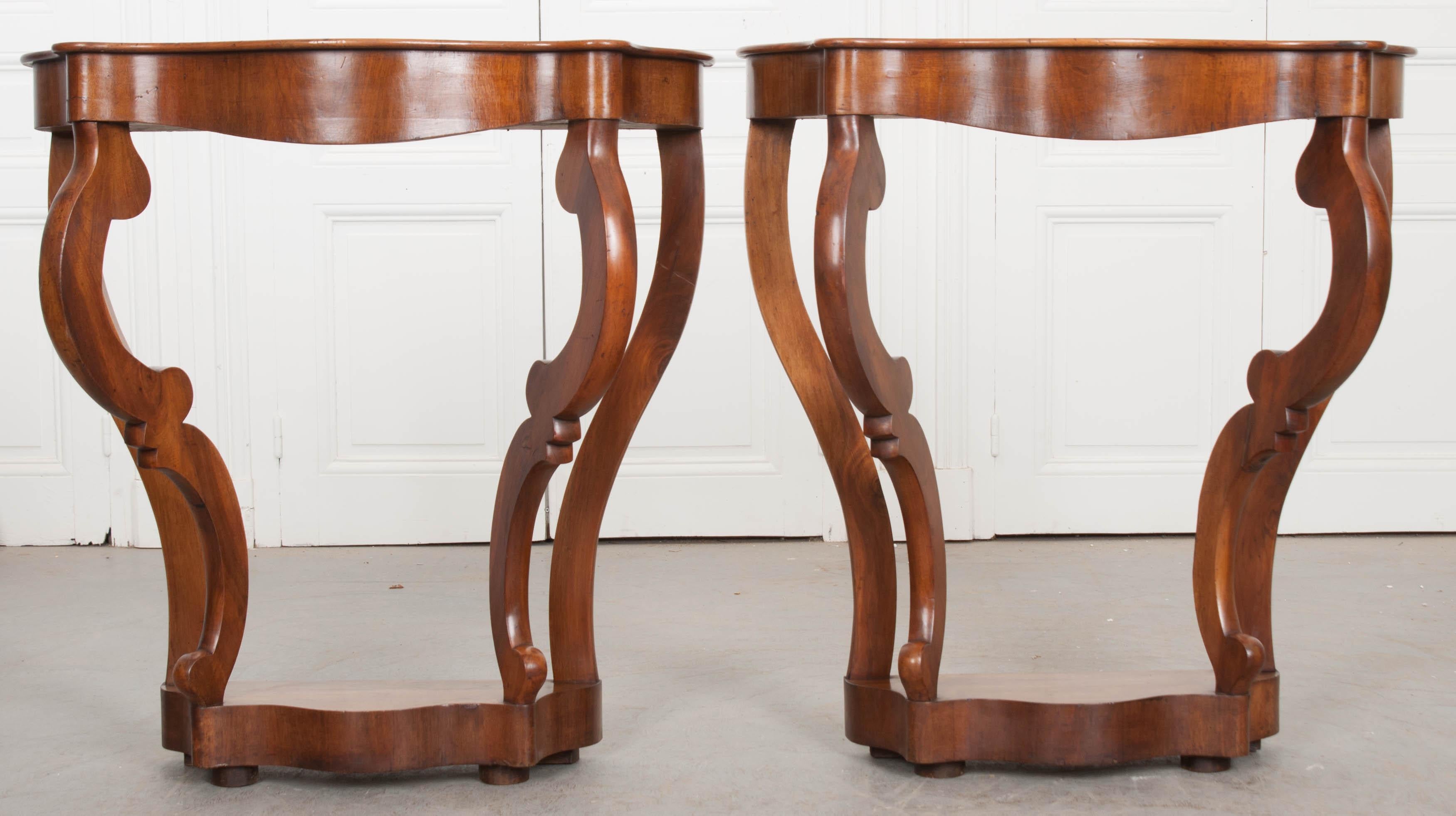 Carved Pair of 19th Century Walnut French Restauration Demilune Consoles