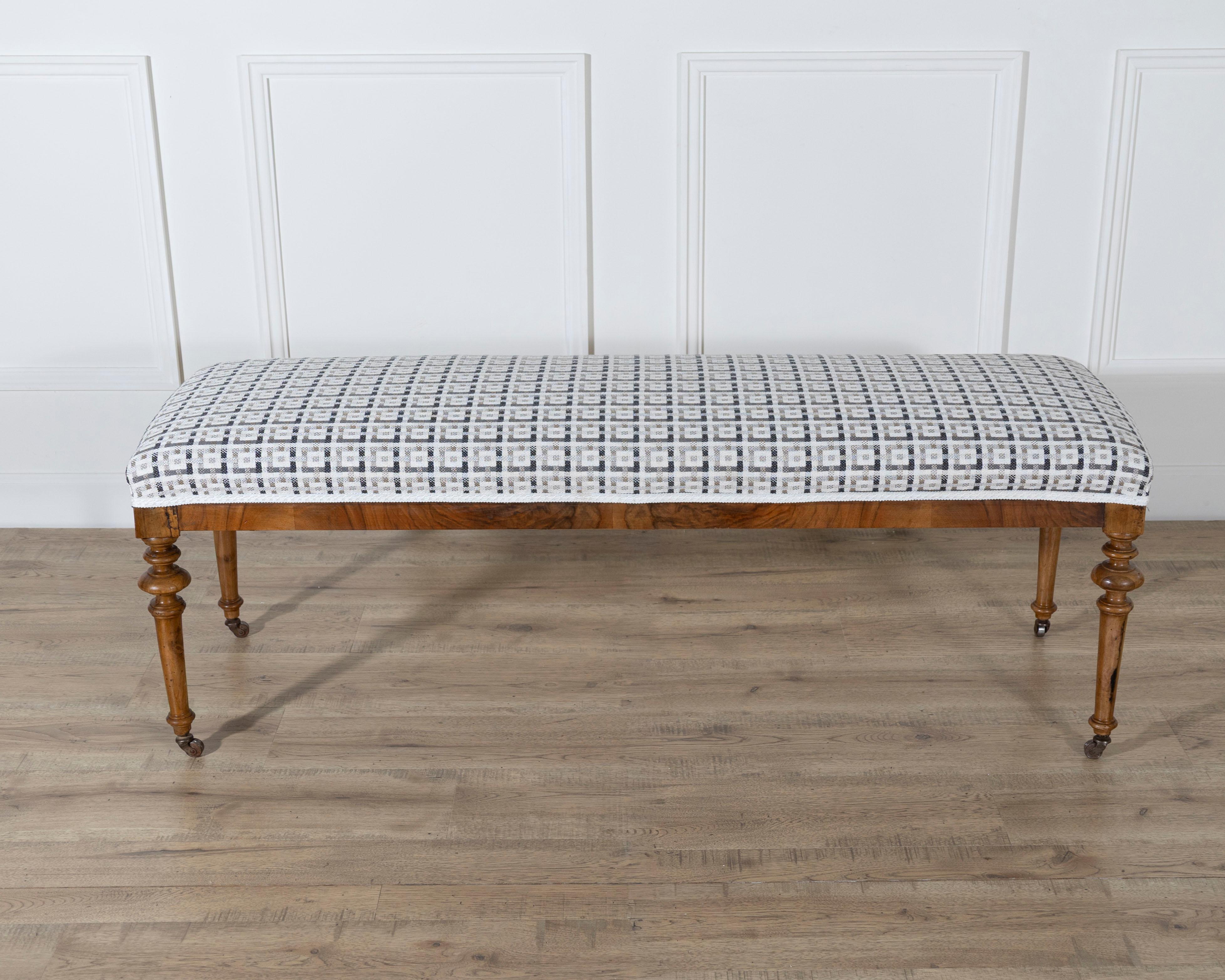 19th Century Pair of 19th-Century Walnut Upholstered Benches with Turned Legs and Casters For Sale