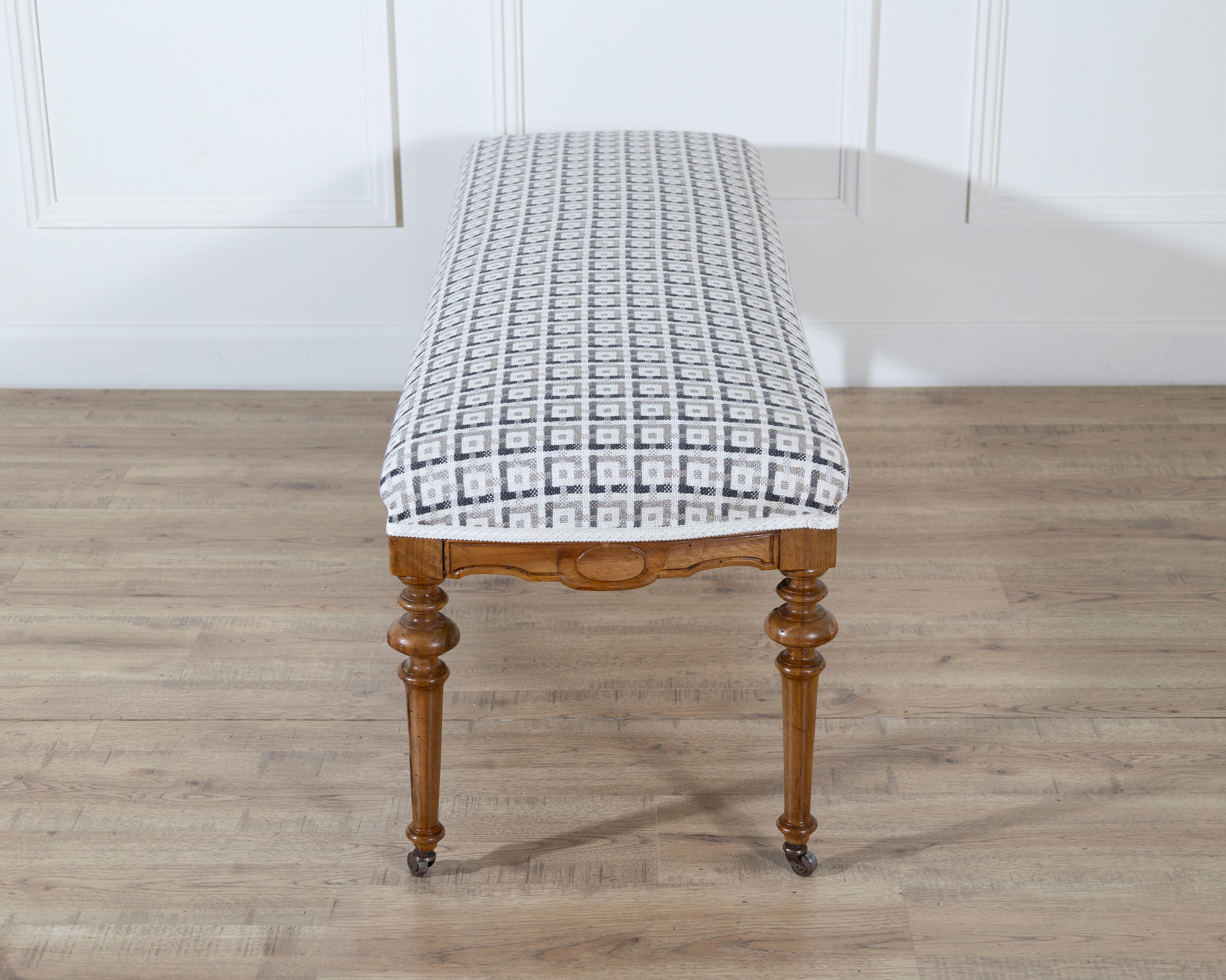 Pair of 19th-Century Walnut Upholstered Benches with Turned Legs and Casters For Sale 3