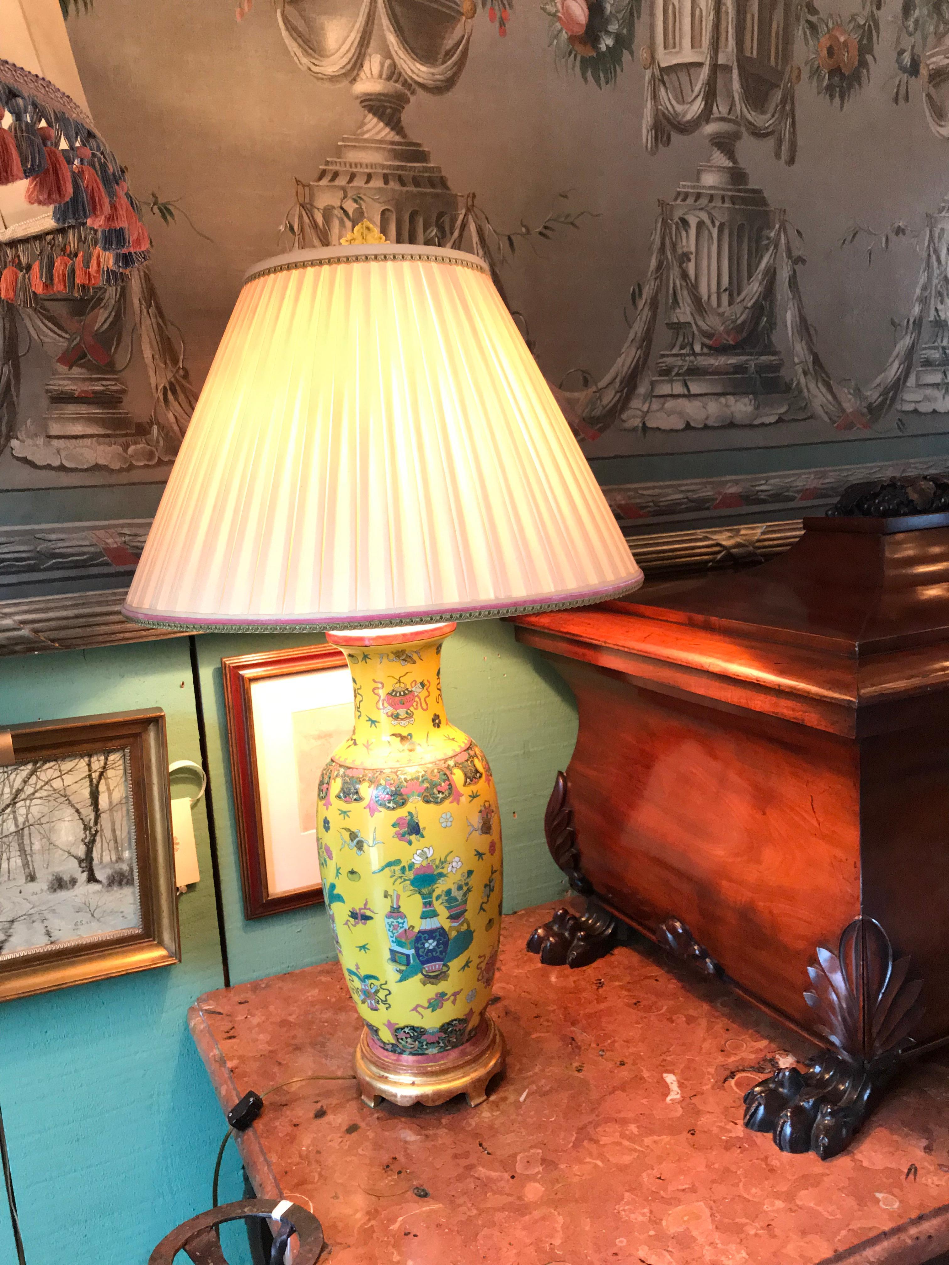 A fine pair of 19th century baluster yellow Chinese vases made into lamps 