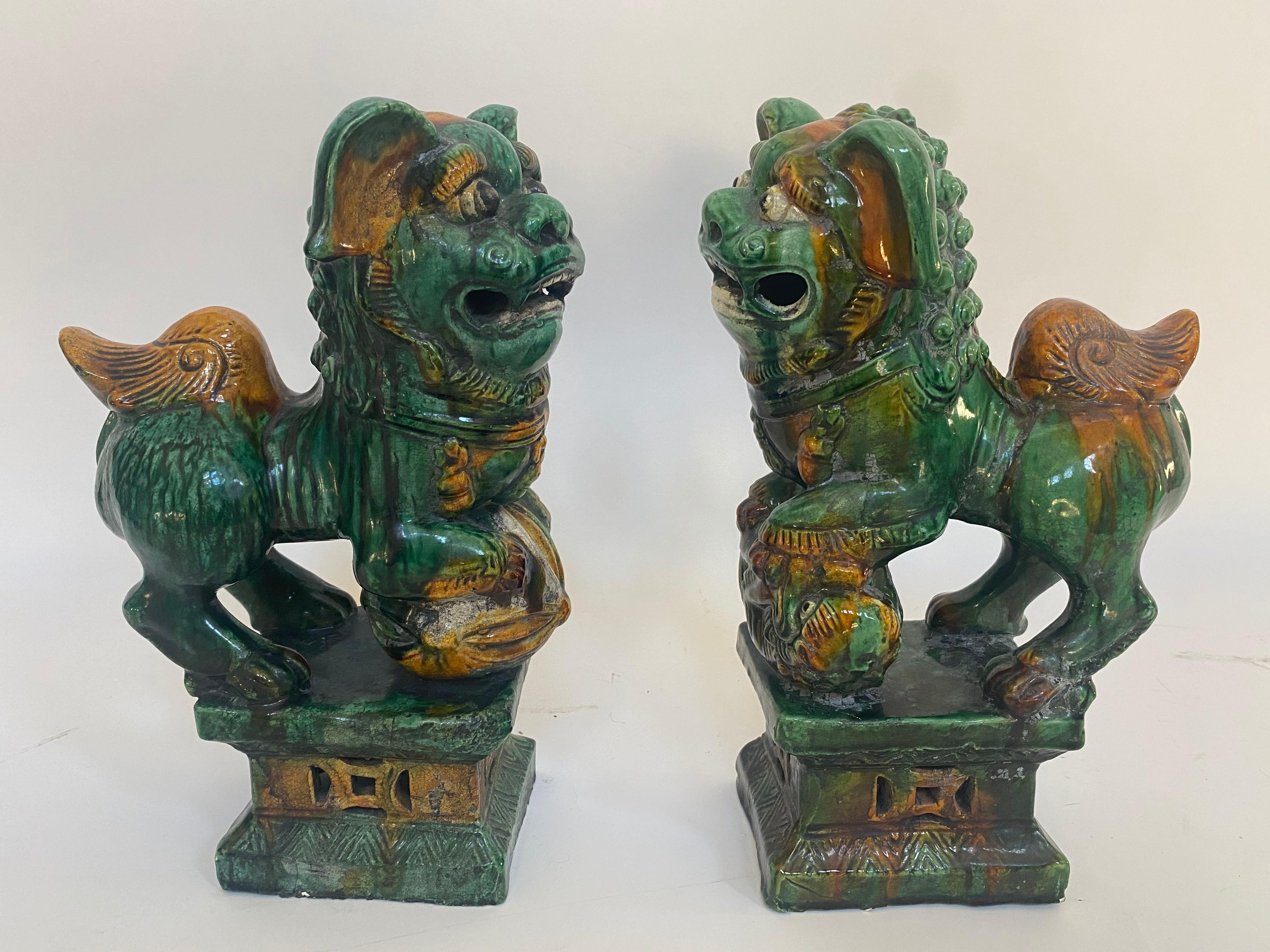 Carved Pair of 19th Chinese Tri-Colored Glazed Foo Lions /Dogs