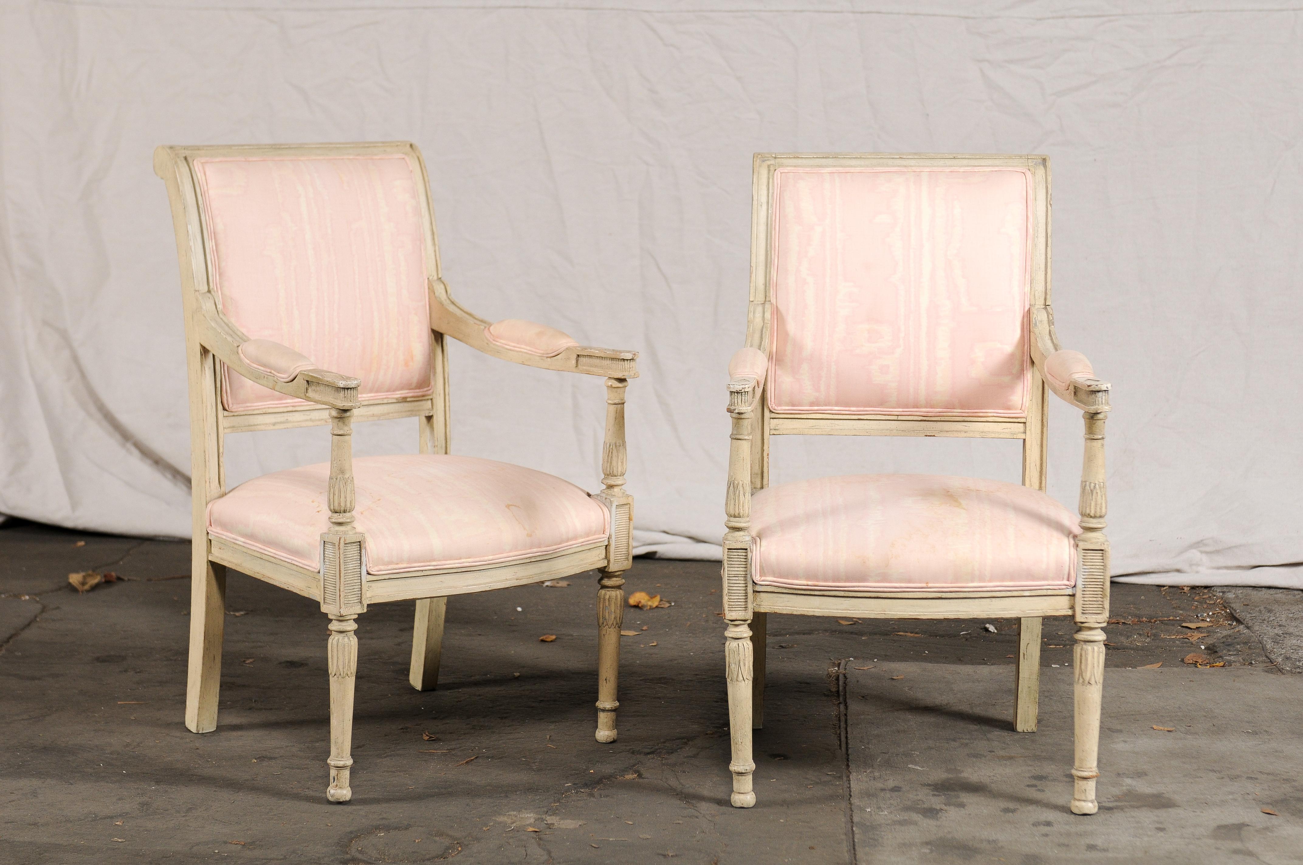 Pair of 19th-early 20th century French child's chairs, painted Directoire style
Measures: 17.75