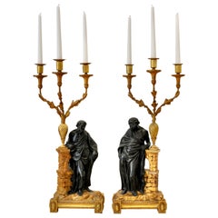 Pareja de candelabros de madera dorada irlandesa de principios del siglo XIX de Sócrates y Platón