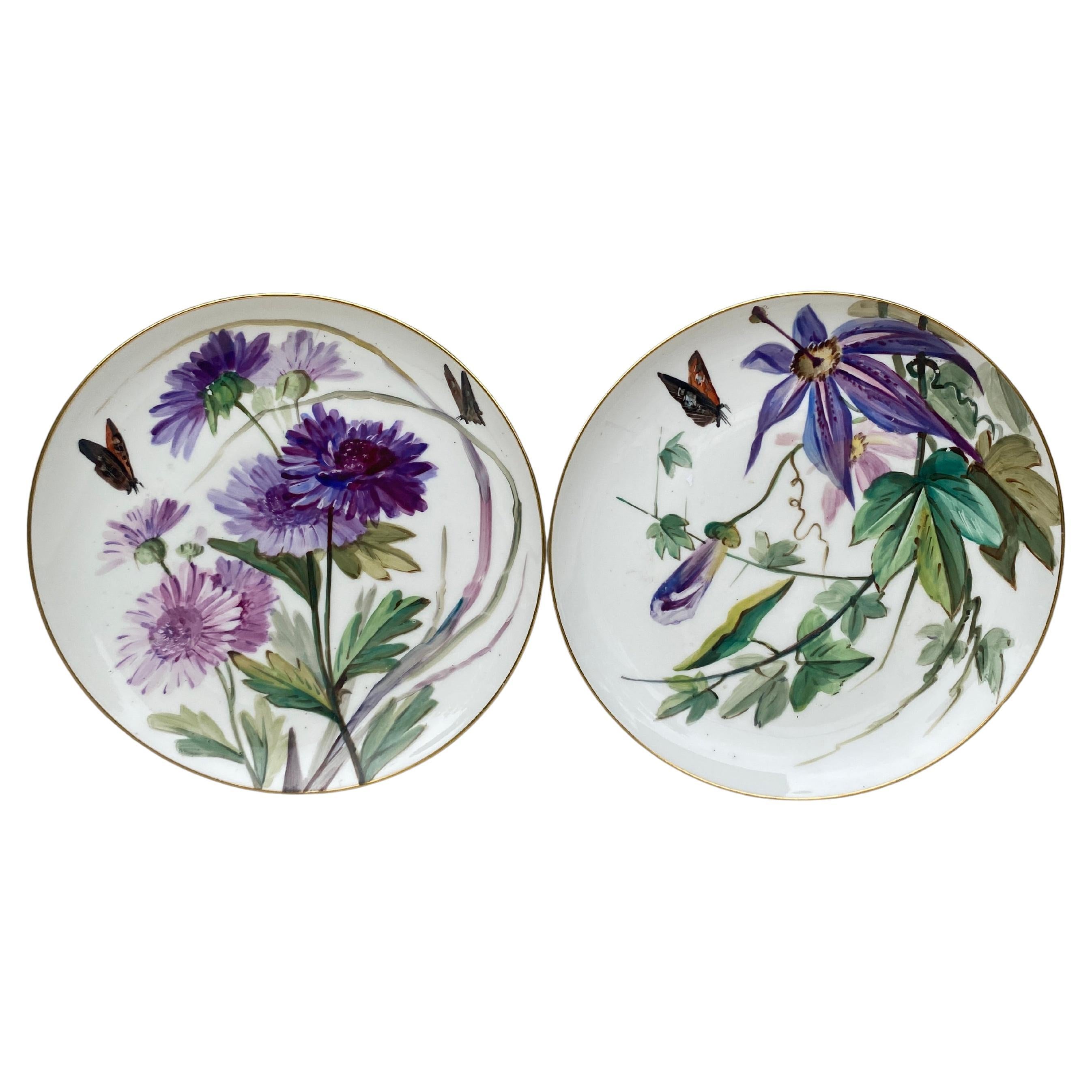 Pair of 19th French Porcelain Plates Flowers & Butterflies Limoges,
Passion flower and dalhias in purple , lavender tones.