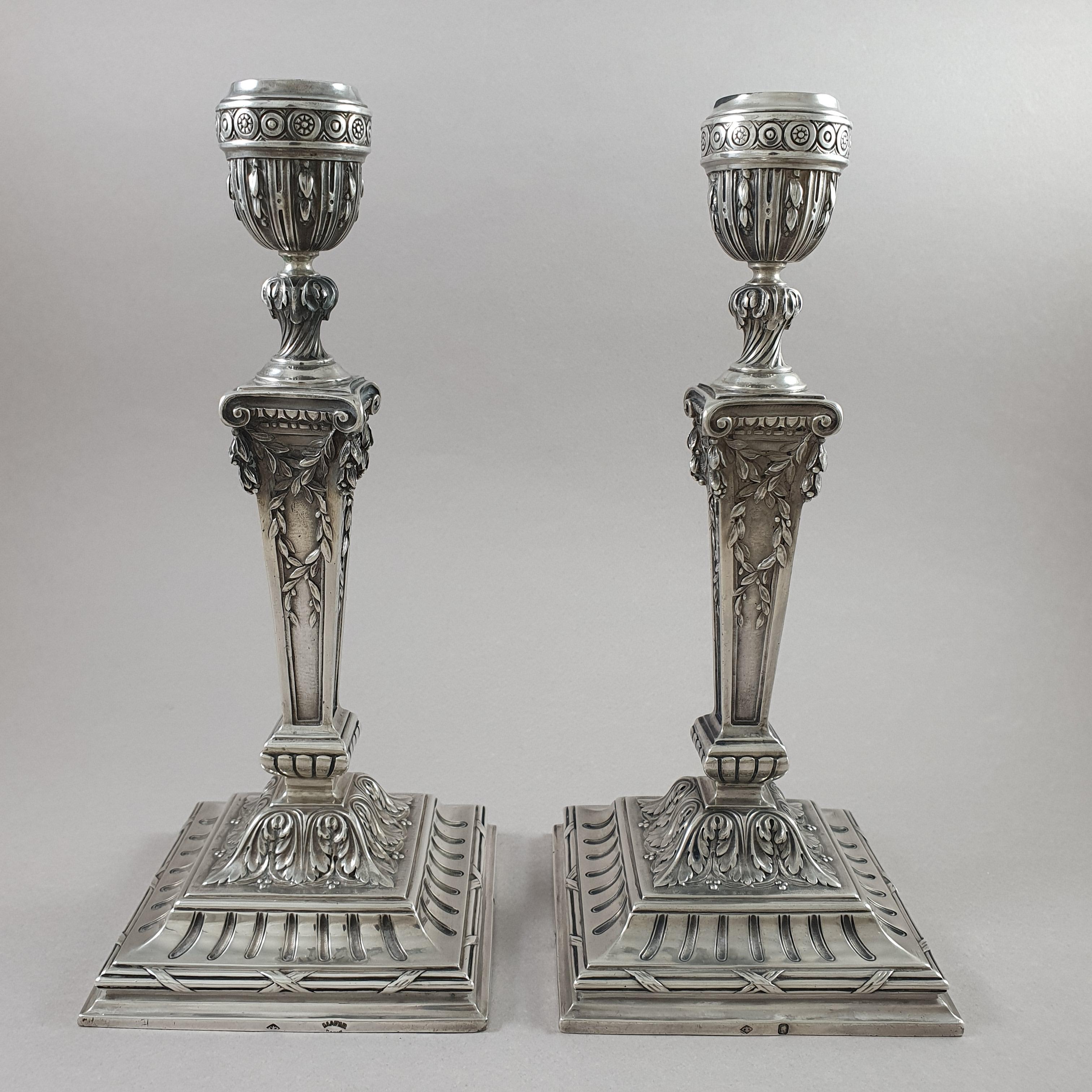 Pair of 19th Sterling Silver candlesticks, circa 1880 

The square base with channels and wrapped threads, the umbilicus and the leafy shaft, the cylindrical binet. 

Hallmarked Minerva 1st title for 950/1000 purity silver
Silversmith: Lapar