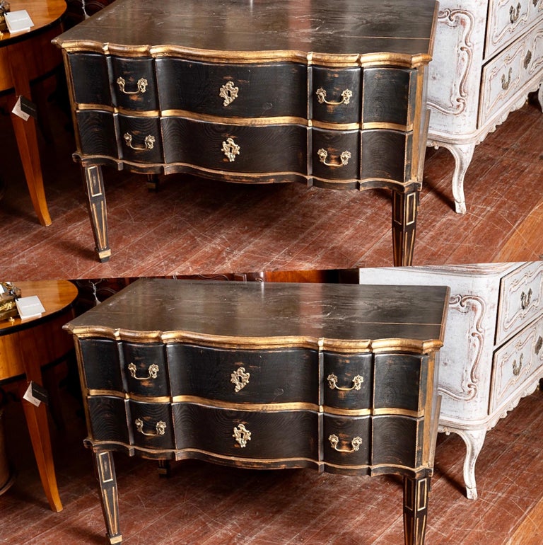 Unusual pair of painted and gilded Swedish commodes.