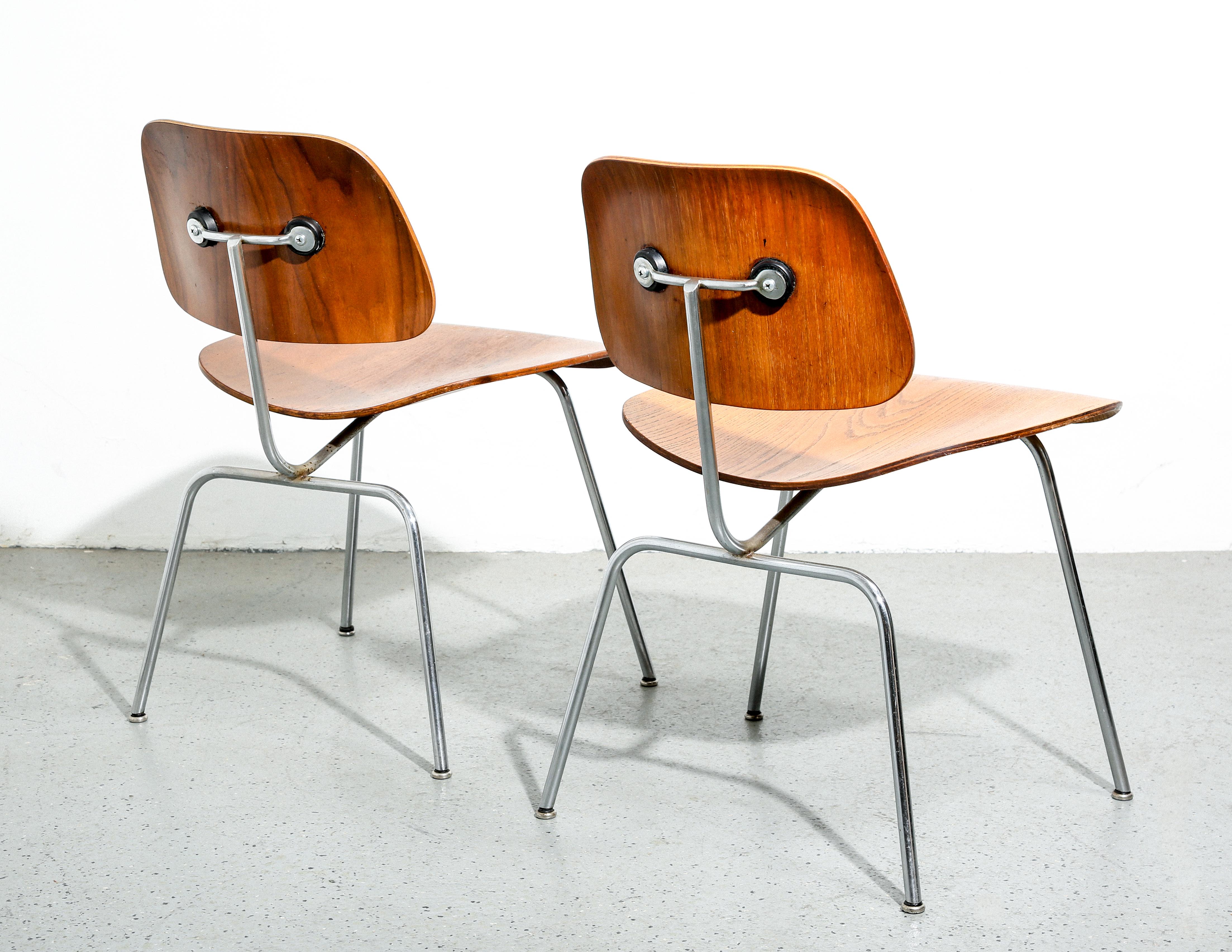 The first generation Eames DCM (Dining Chair Metal) chairs represent a landmark in furniture design, embodying the innovative spirit of mid-century modernism. Originally produced by the Adams Company in the early 1940s, these chairs were the