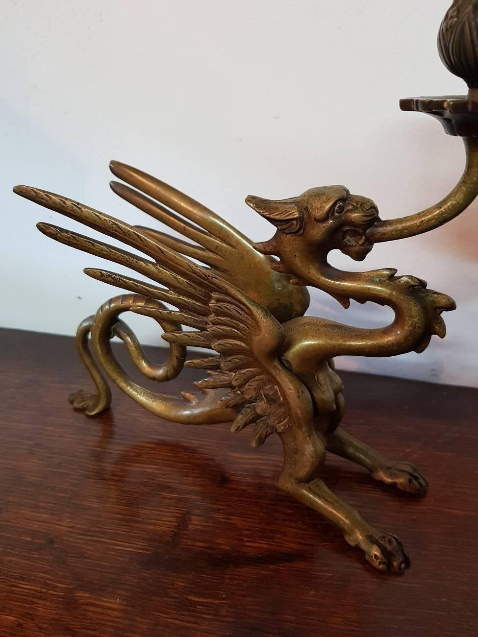 Pair of two awesome 19th century bronze dragon candlesticks with nice detailed design.

The measurements are,
Depth 21 cm/ 8.2 inch.
Width 7 cm/ 2.7 inch.
Height 20 cm/ 7.8 inch.
      
