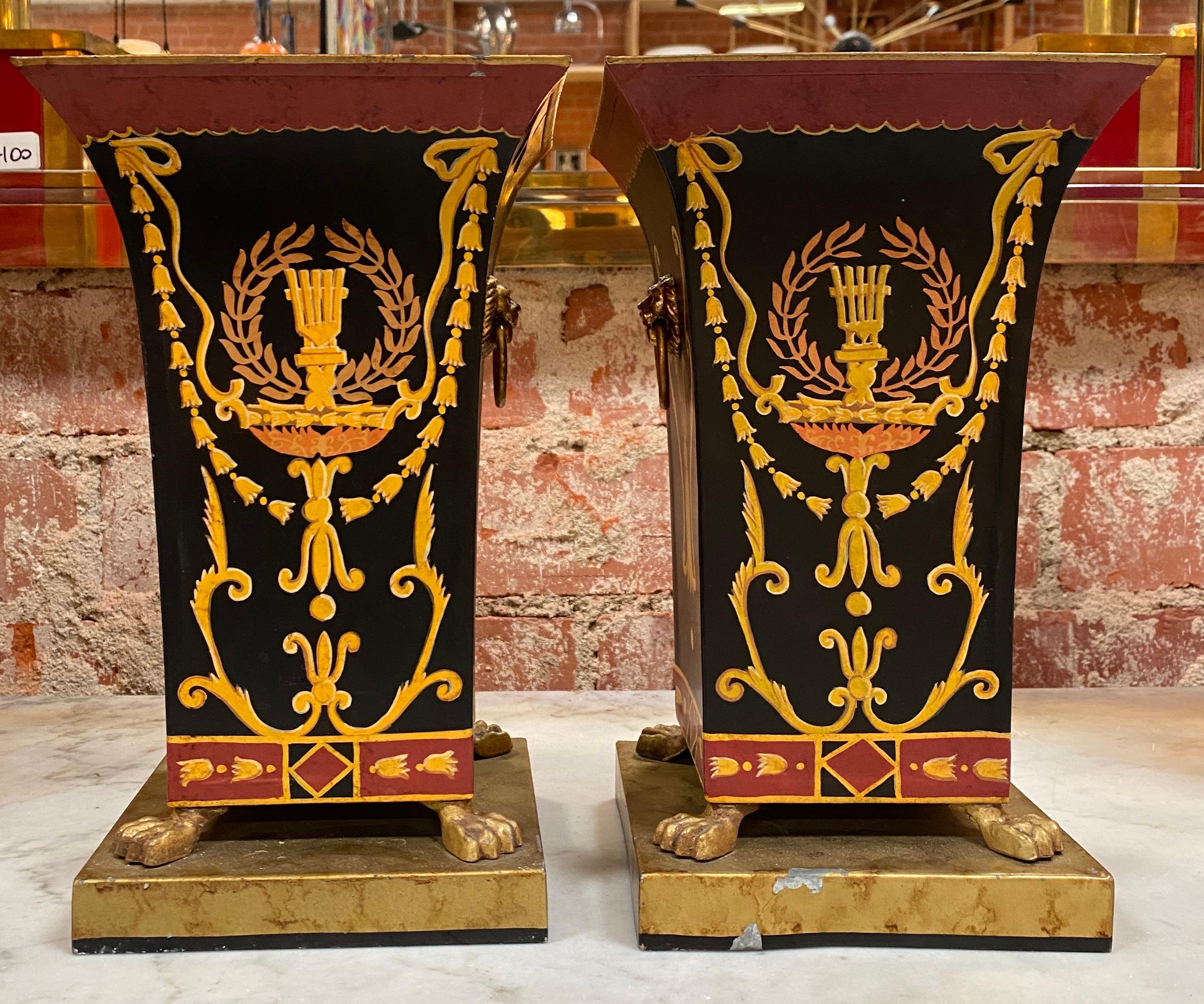 Beautiful pair of 2 antique vase made with iron and brass detail. The vases are used as you can see from the picture but they are still beautiful and unique.
 