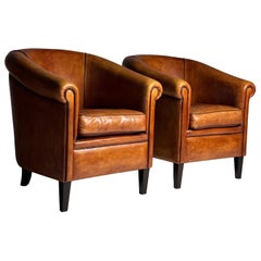 Pair of 2 Dutch Sheep’s leather clubchairs
