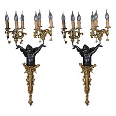 Pair of (2) Empire bronze putto sconces, gilt