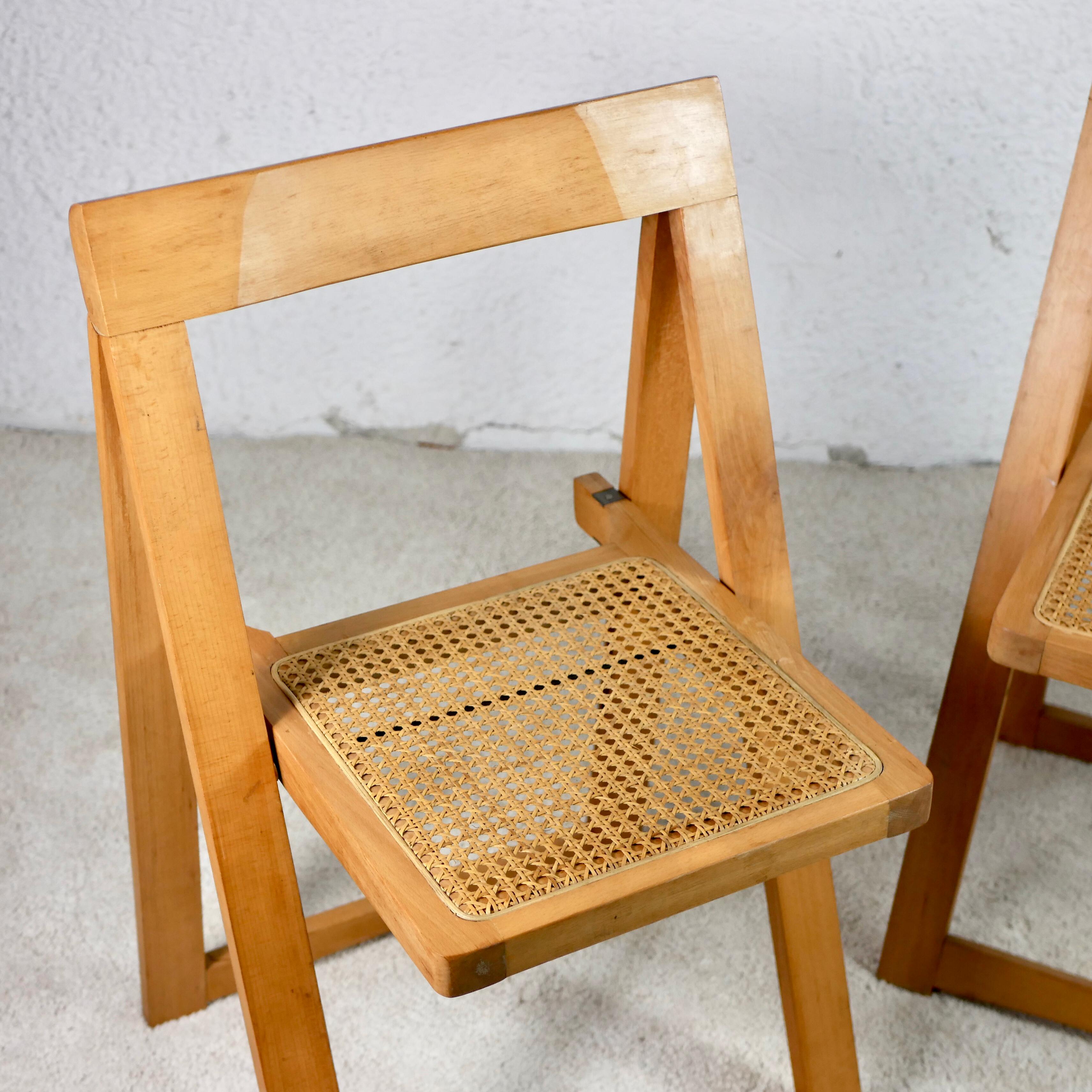 Wonderful pair of folding cane chairs, Trieste model, designed by Aldo Jacober, in the 1960s.
These ones have been made in the former Yugoslavia and wear their stamp 
