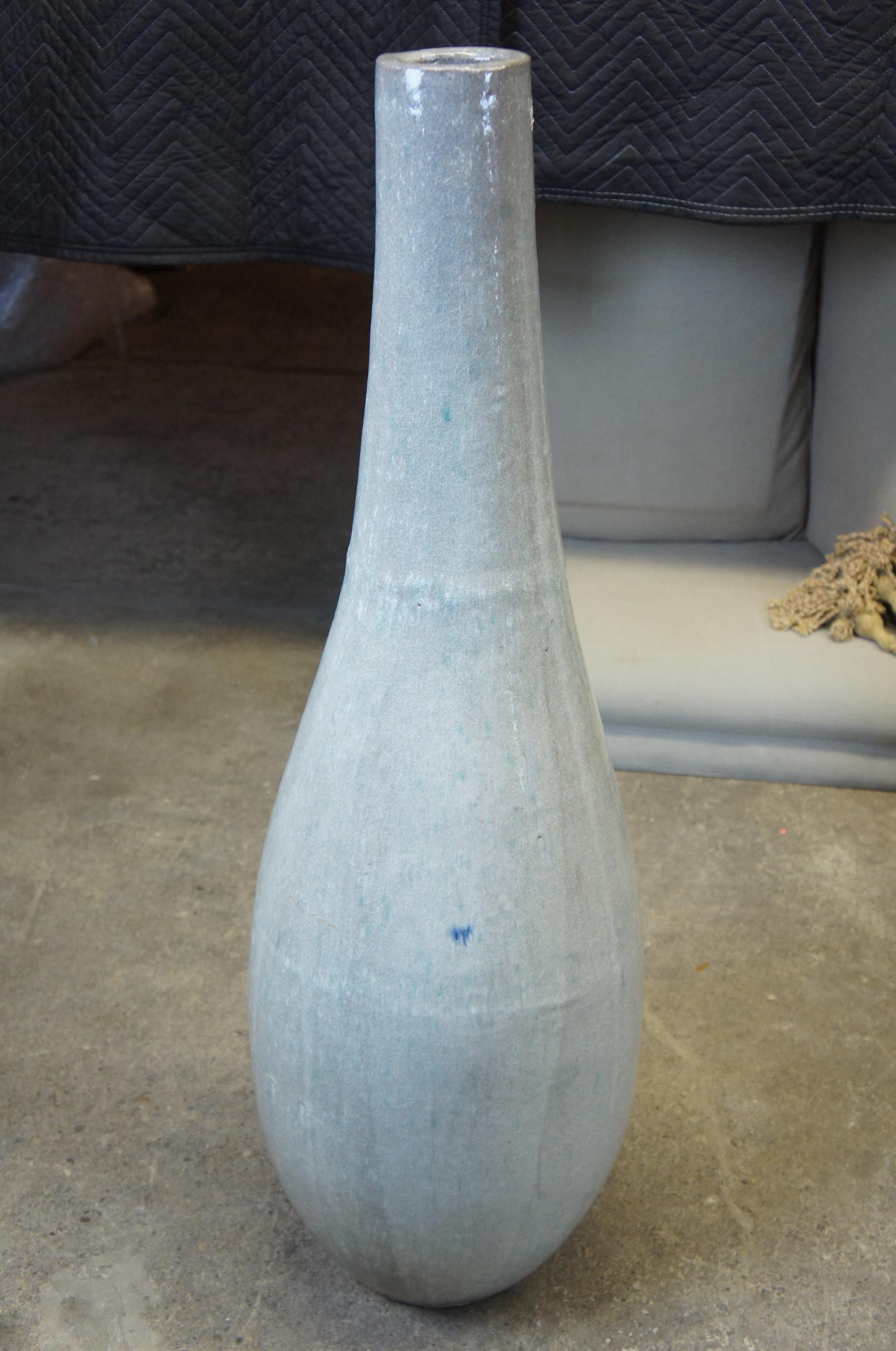 tall grey floor vase
