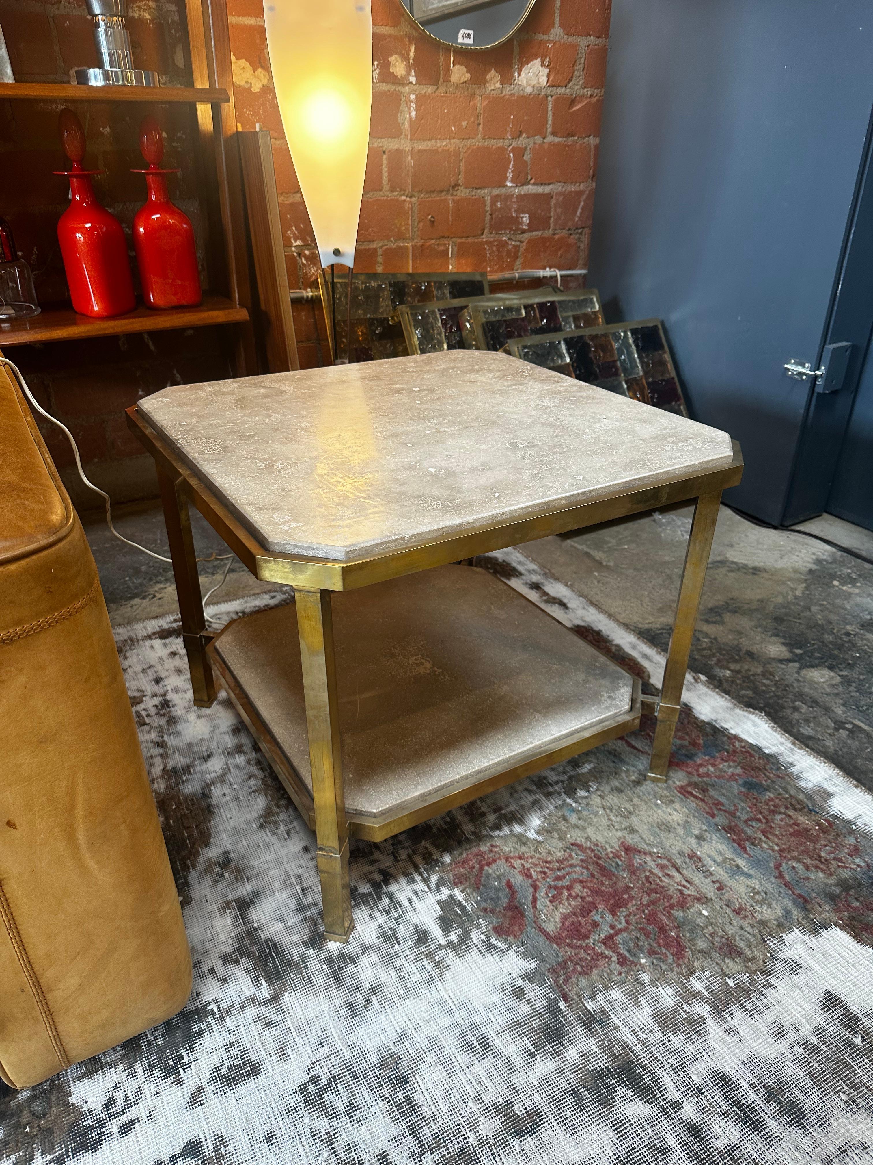 Extraordinary pair of 2 travertine and brass base side tables made in Italy in 1980s. The tables are in very good conditions and presents minor usage. Nothing touches, nothing clashes, which gives this piece of furniture a completely peaceful yet