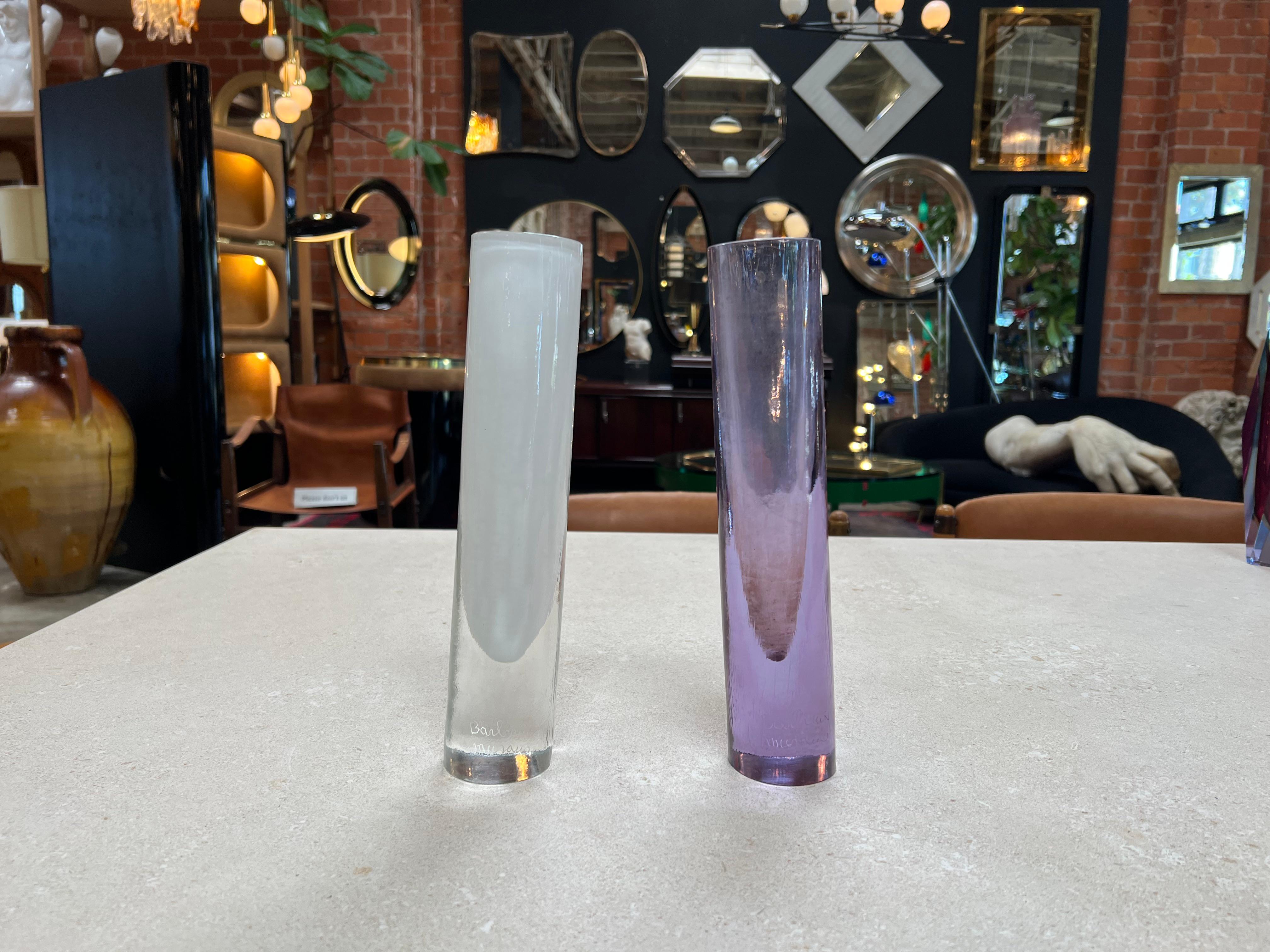 The Pair of 2 Italian Decorative Murano Small Vases from the 1960s is a duo of exquisite handcrafted vases hailing from Murano, Italy. These delicate pieces reflect the renowned Murano glass-making tradition, featuring intricate designs and vibrant