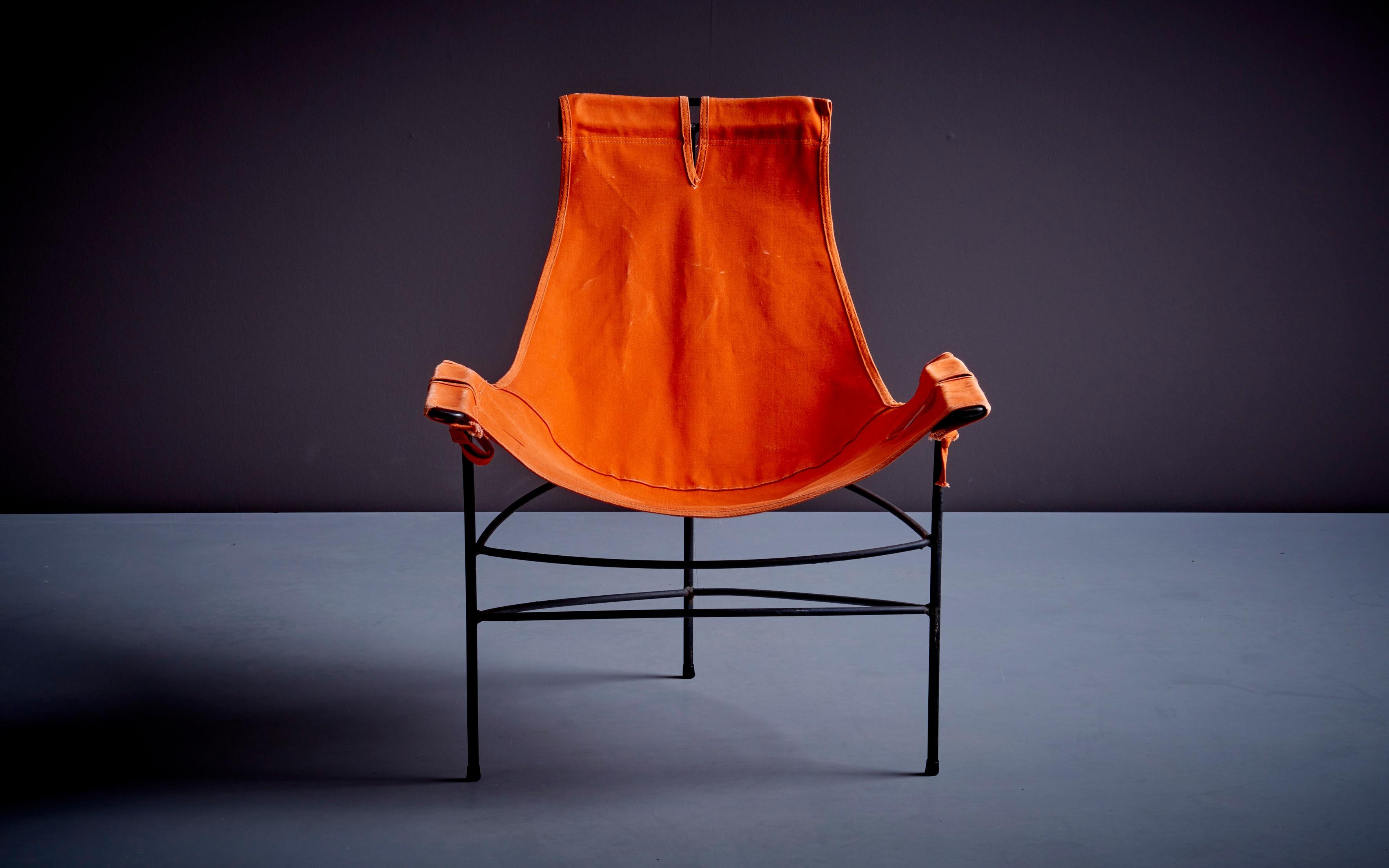Pair of 2 lounge chairs by Jerry Johnson in orange canvas, USA, 1950s.
