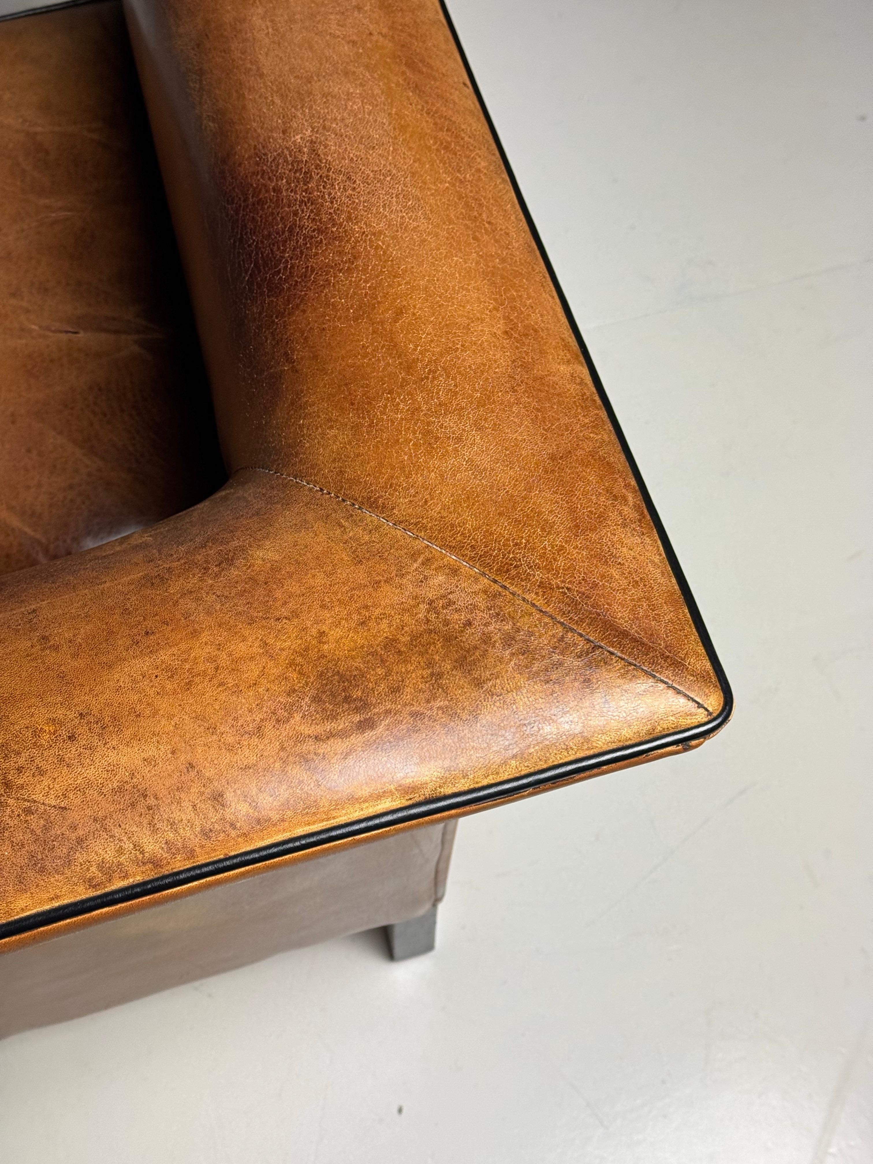 Pair of 2 Sheep’s leather Art Deco clubchairs 1