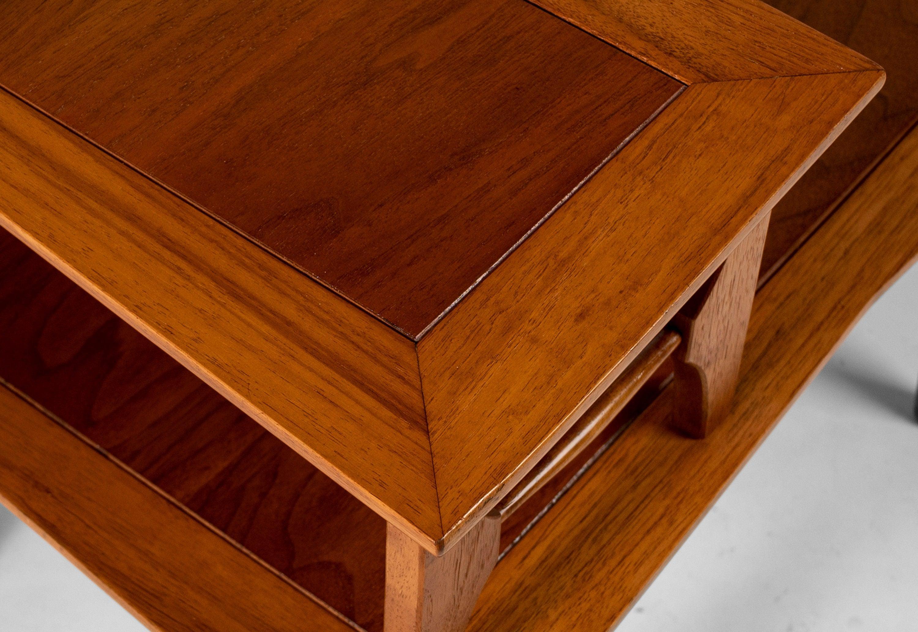 A truly exceptional build and architectural design. This set of two end tables is constructed from pecan having been created from a hand-picked selection of the finest cuts. The angular design draws visual interest. The two tier design provides