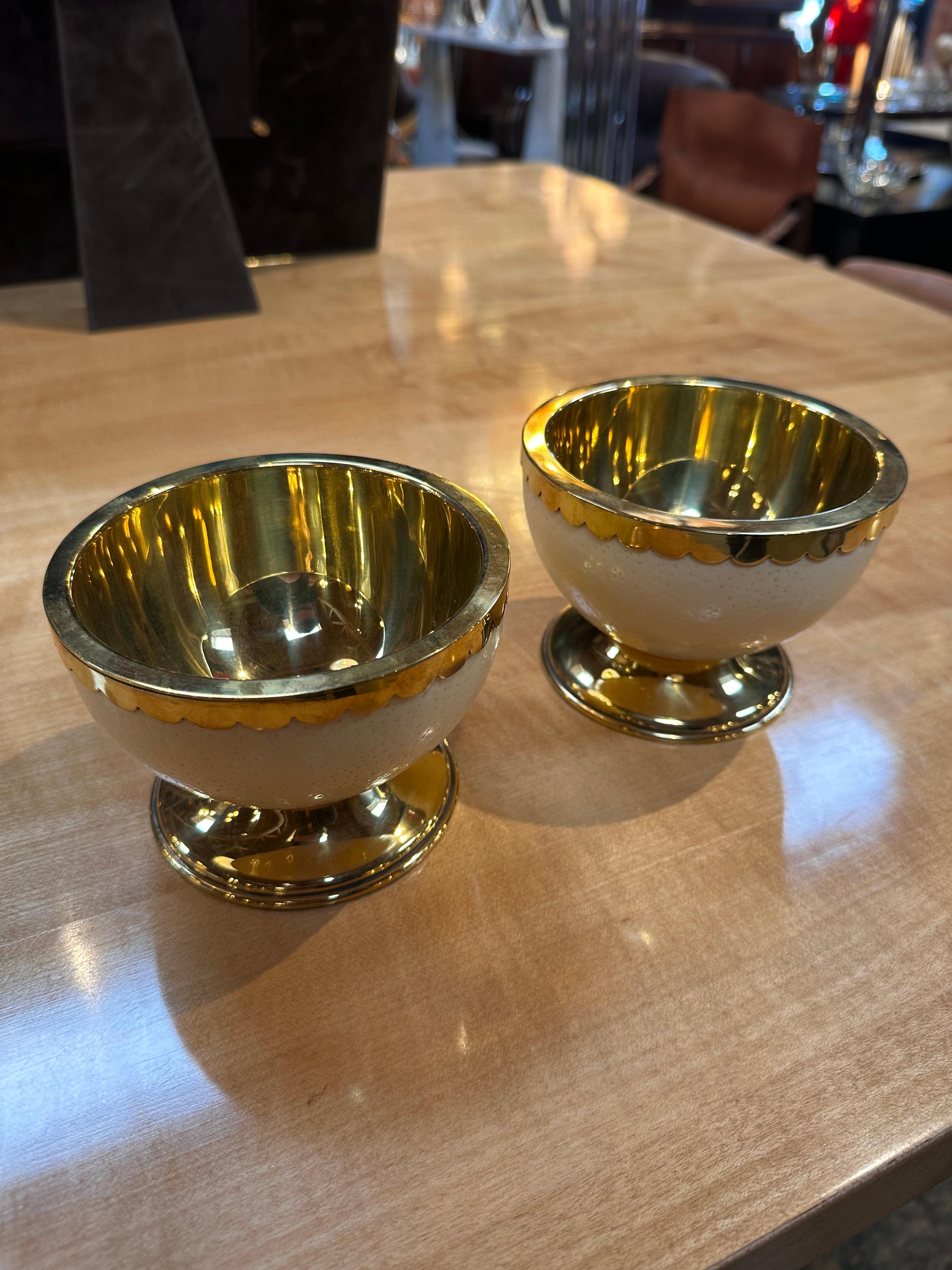 The Pair of 2 Unique Christian Dior Decorative Bowls is an exquisite and stylish set. Crafted by Christian Dior, these bowls showcase exceptional design and quality. The unique detailing and branding reflect the luxury and sophistication associated
