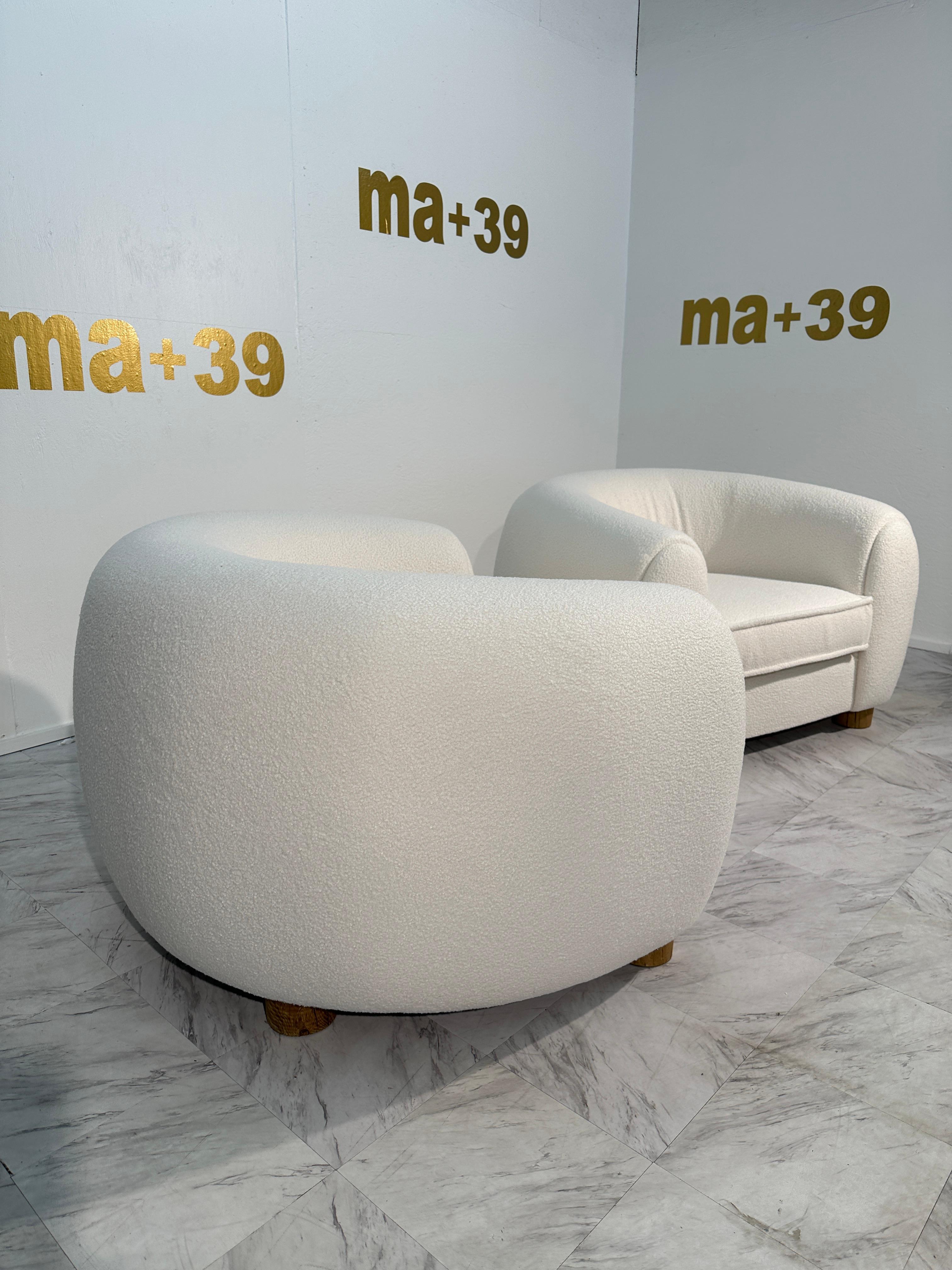 Step into the timeless embrace of design history with this exquisite Pair of 2 Vintage Mid Century Polar Armchairs by Jean Royère, crafted in the iconic 1960s. Royère's unmistakable touch is evident in the organic curves and sculptural lines of