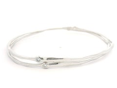 Coppia di 2 braccialetti in oro bianco con diamante a castone da 0,16 carati, liberi di essere indossati