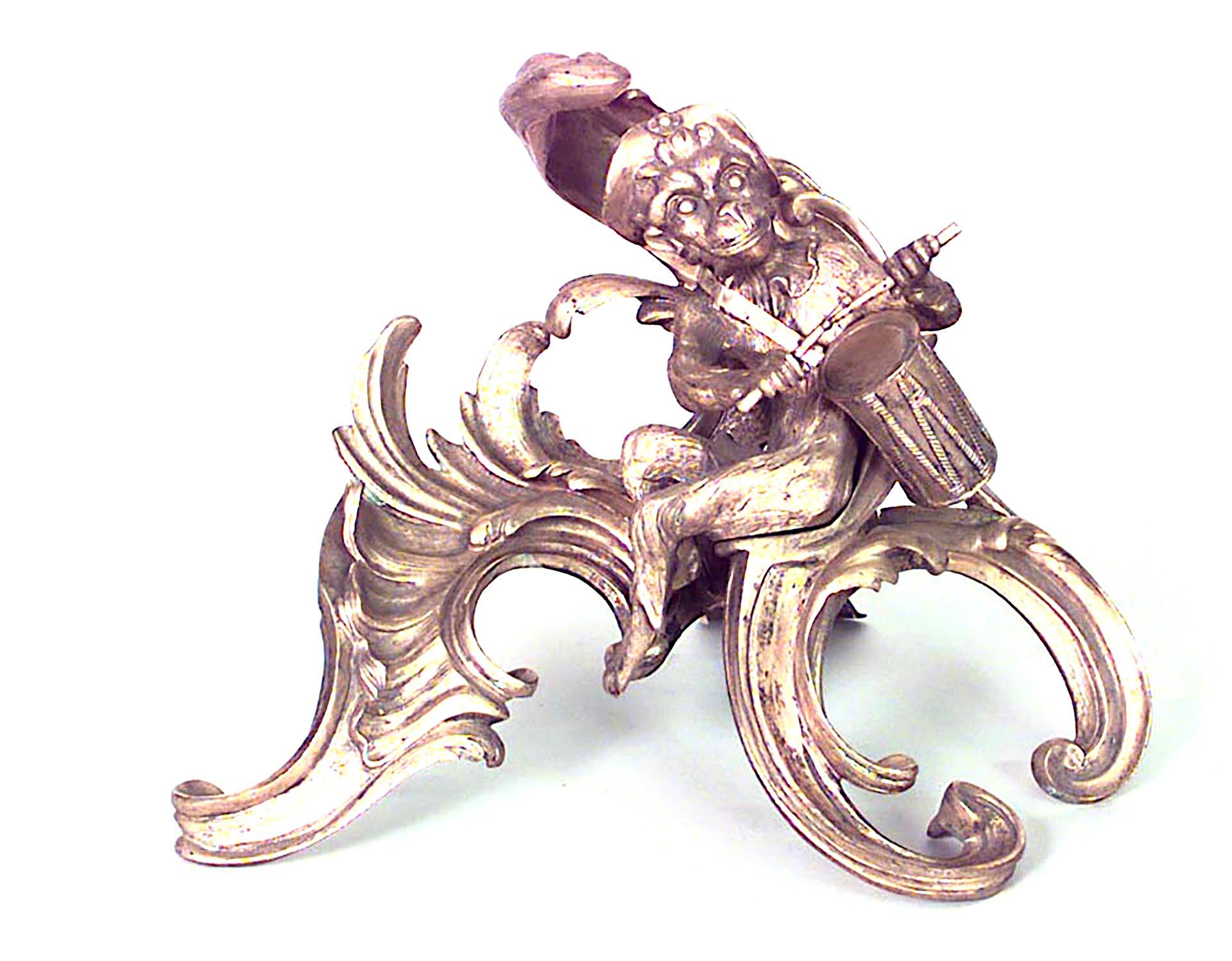 Pair of French Louis XV-style (20th Century) bronze dore andirons with monkey playing musical instruments. (PRICED AS Pair)
