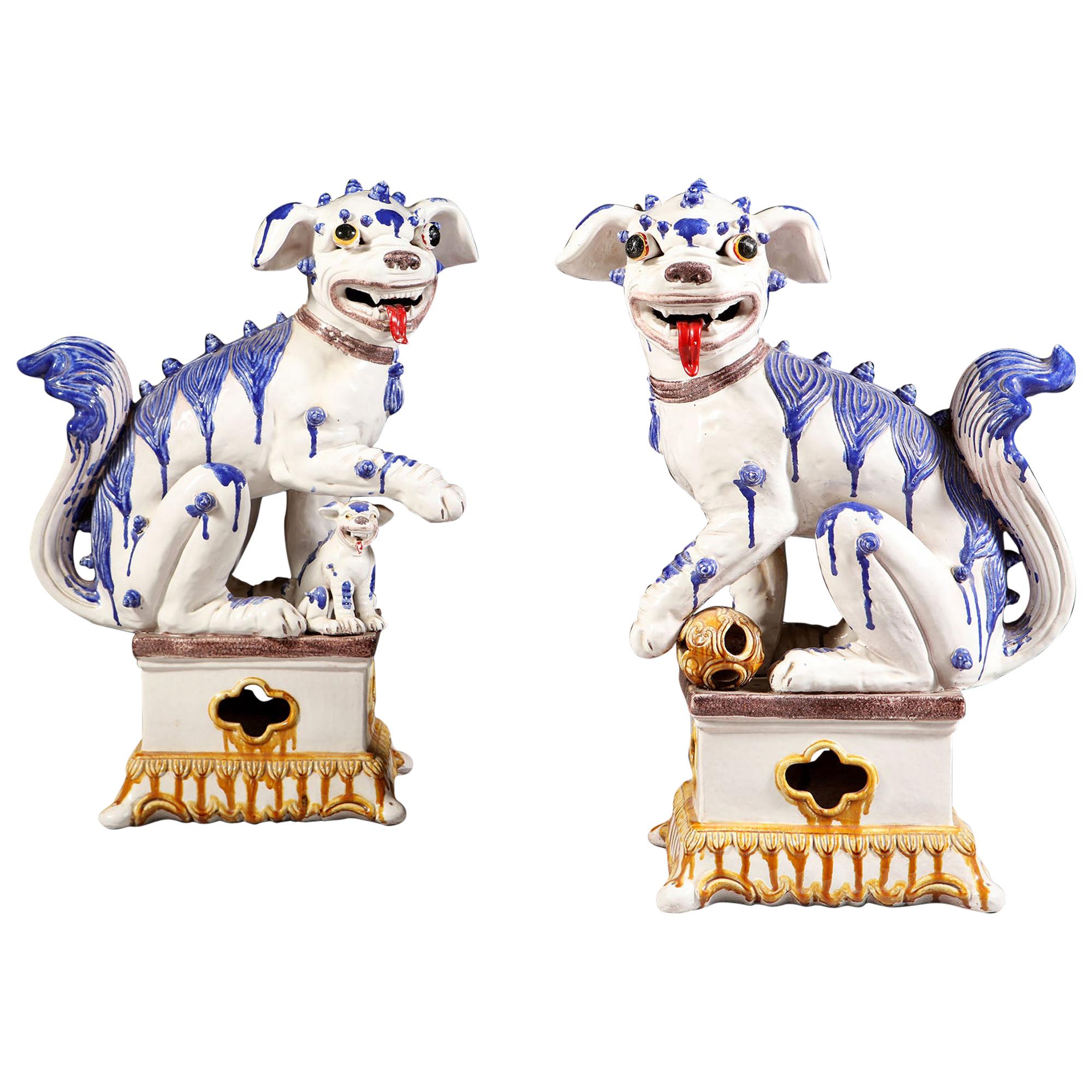 Pair of French Pottery Dogs of Fo in Blue and White Glaze, Probably Samson