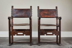 Coppia di poltrone sudamericane del XX secolo con seduta e schienale in pelle