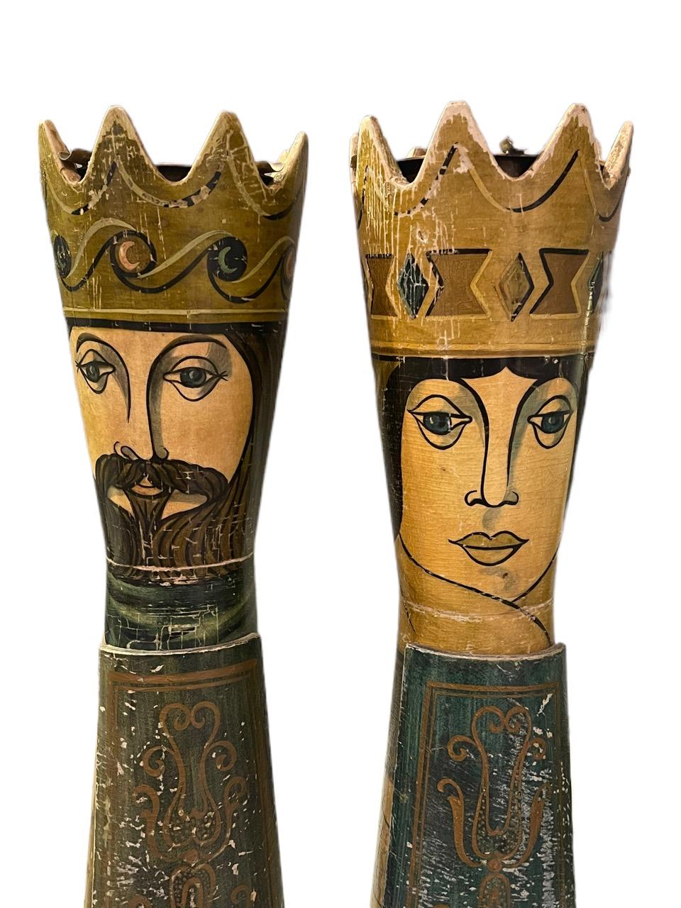 A pair of 20th century (1960s) Italian standing floor ashtrays in goatskin and metal brass details made by Aldo Tura. They are modeled as a King and a Queen. Both have small doors to store cigarettes. They can also be used as floral vases.
 