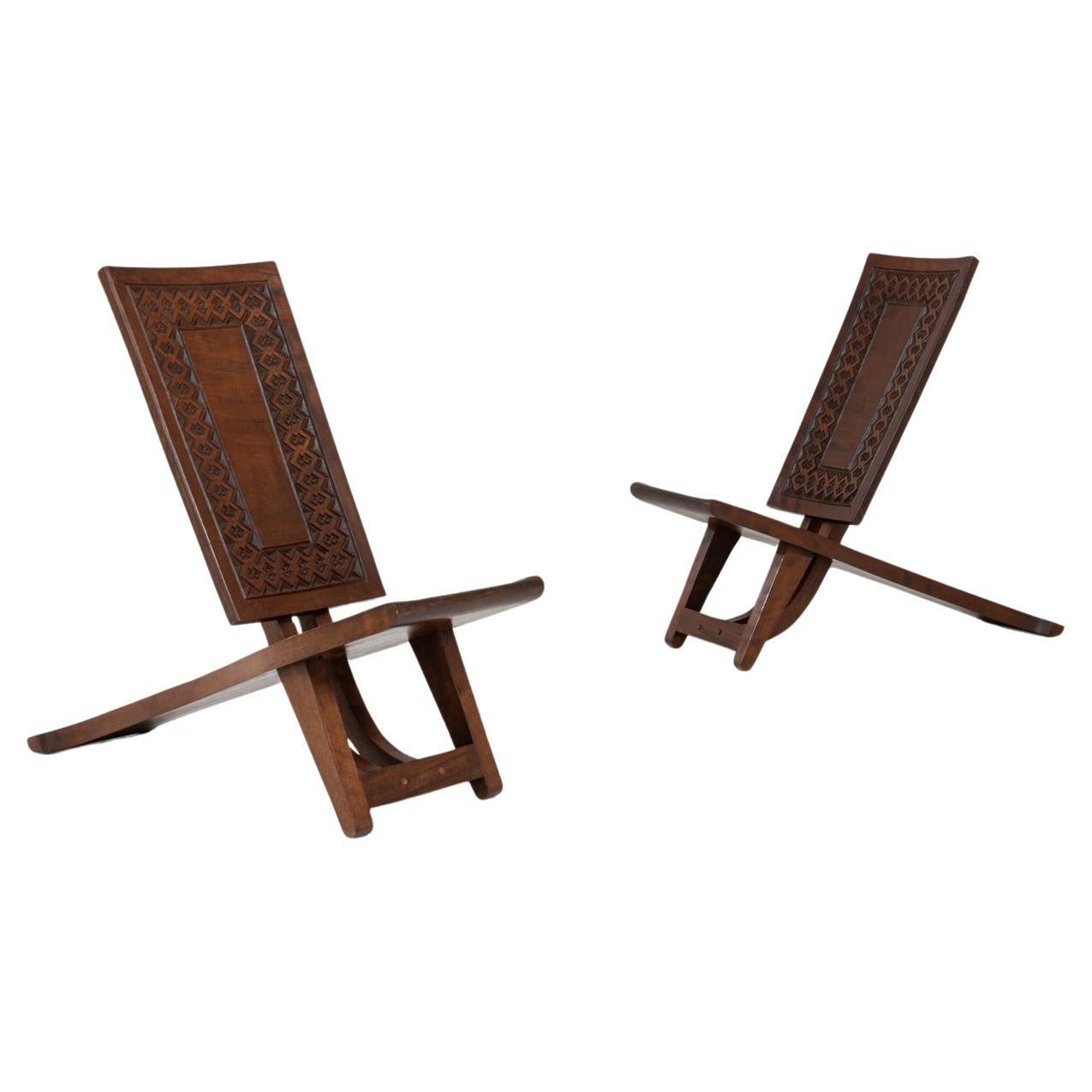 Paire de chaises africaines du 20ème siècle en bois sculpté du Congo