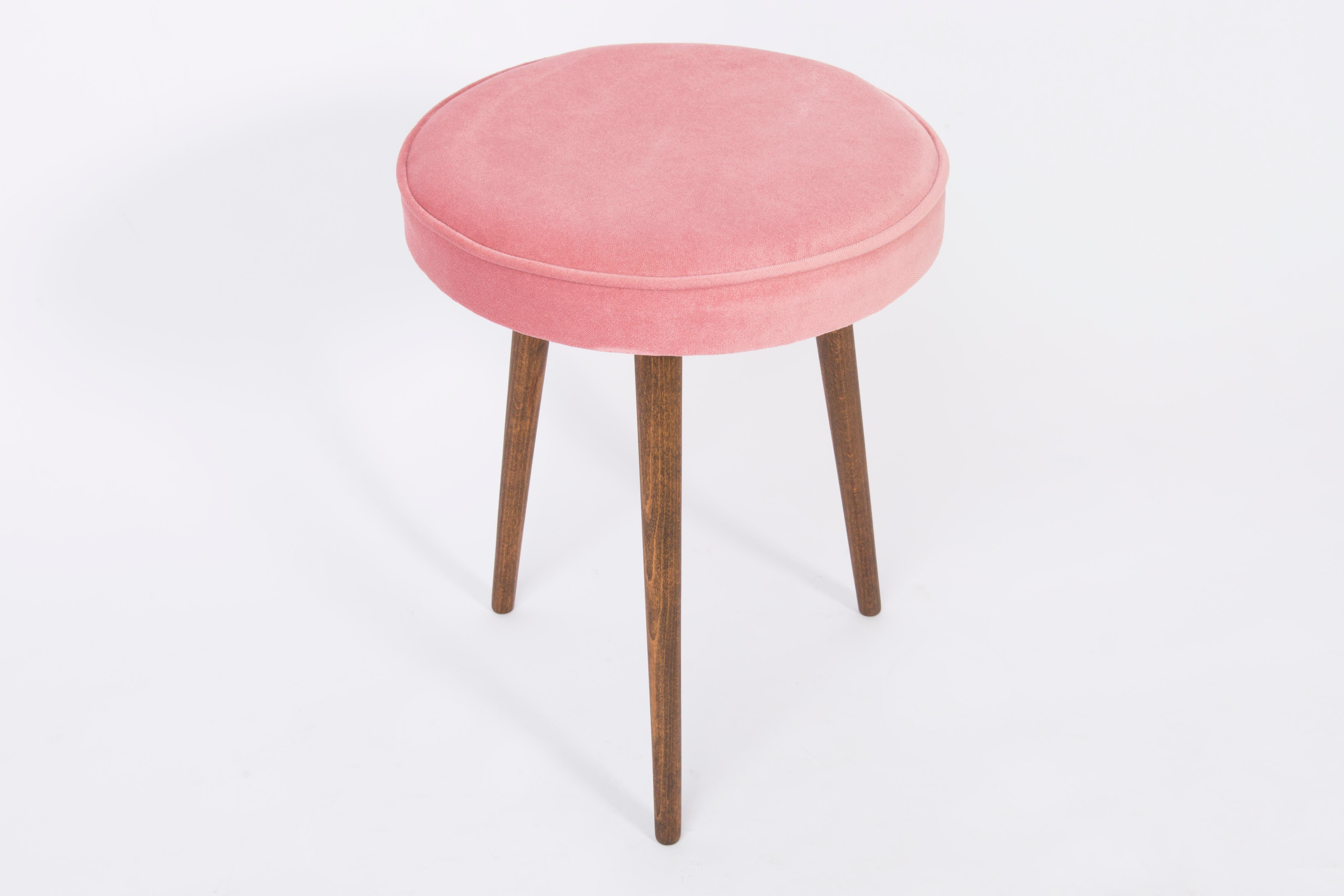 Stools from the turn of the 1960s and 1970s. Beautiful velvet baby pink upholstery. The stools consists of an upholstered part, a seat and wooden legs narrowing downwards, characteristic of the 1960s style. We can prepare this pair also in another