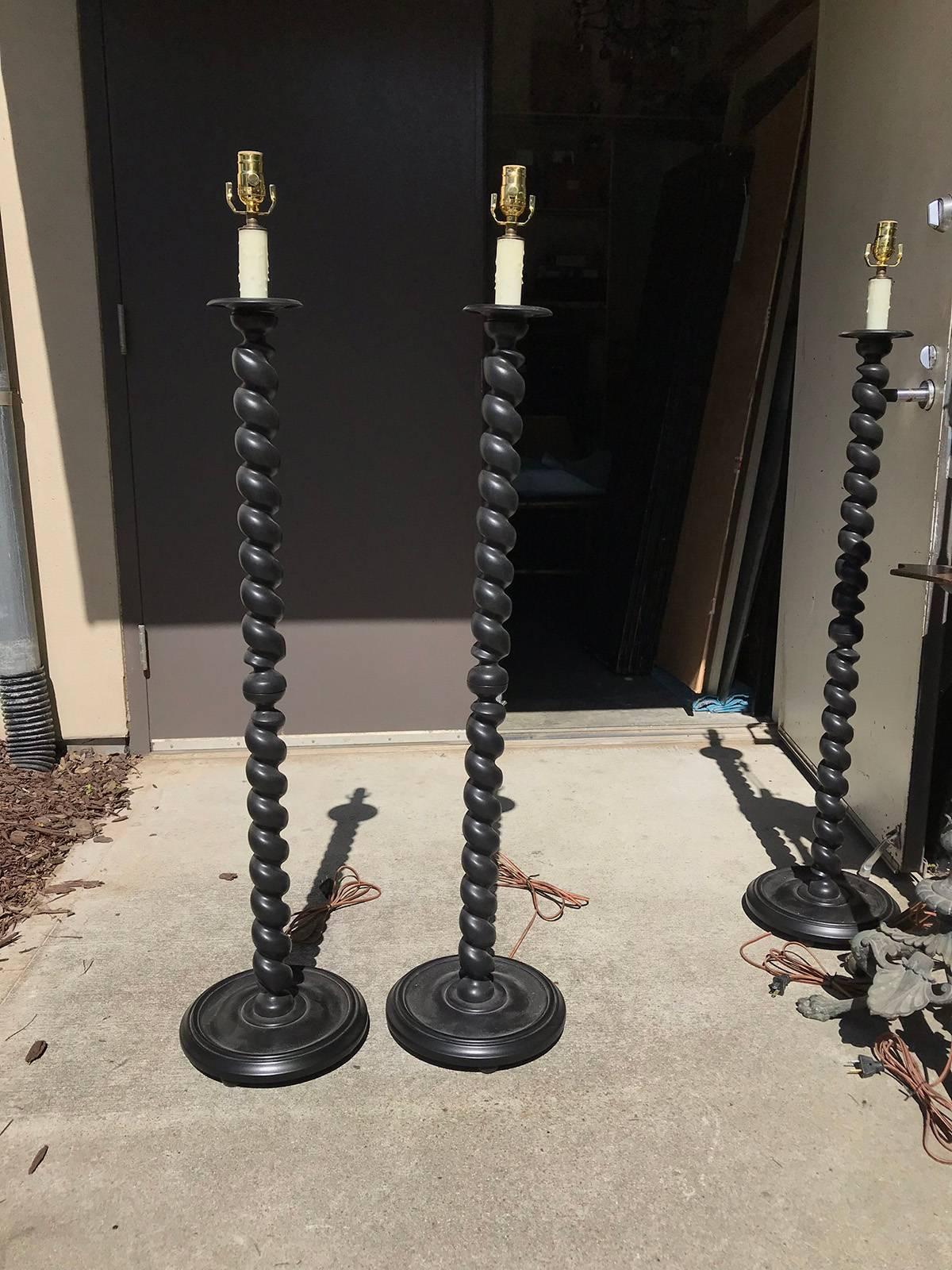 Pair of 20th century barley twist turned custom ebony wooden floor lamps.