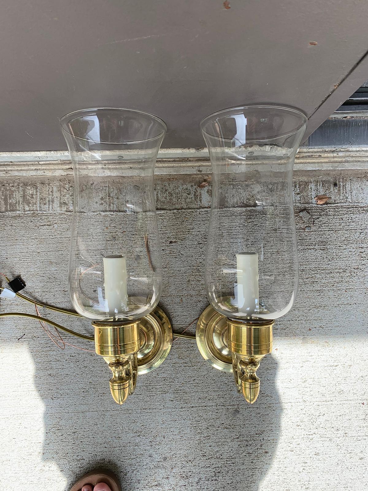 Pair of 20th century brass one-arm sconces with hurricanes
New wiring
Backplate measures 4.75