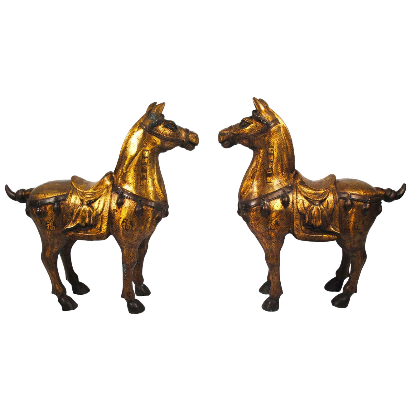 Coppia di cavalli da regalo in bronzo dorato del XX secolo
