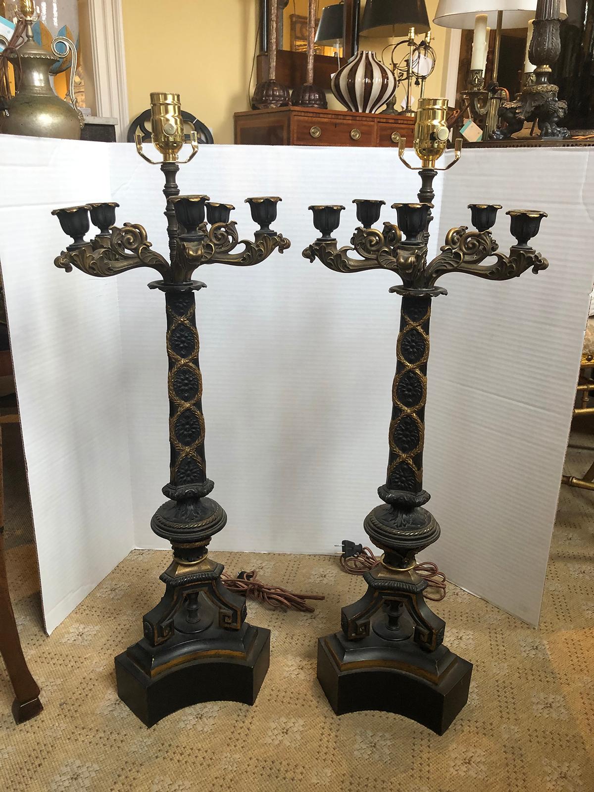 Pair of 20th century bronze and gilt five-arm candelabra as lamps
New wiring.