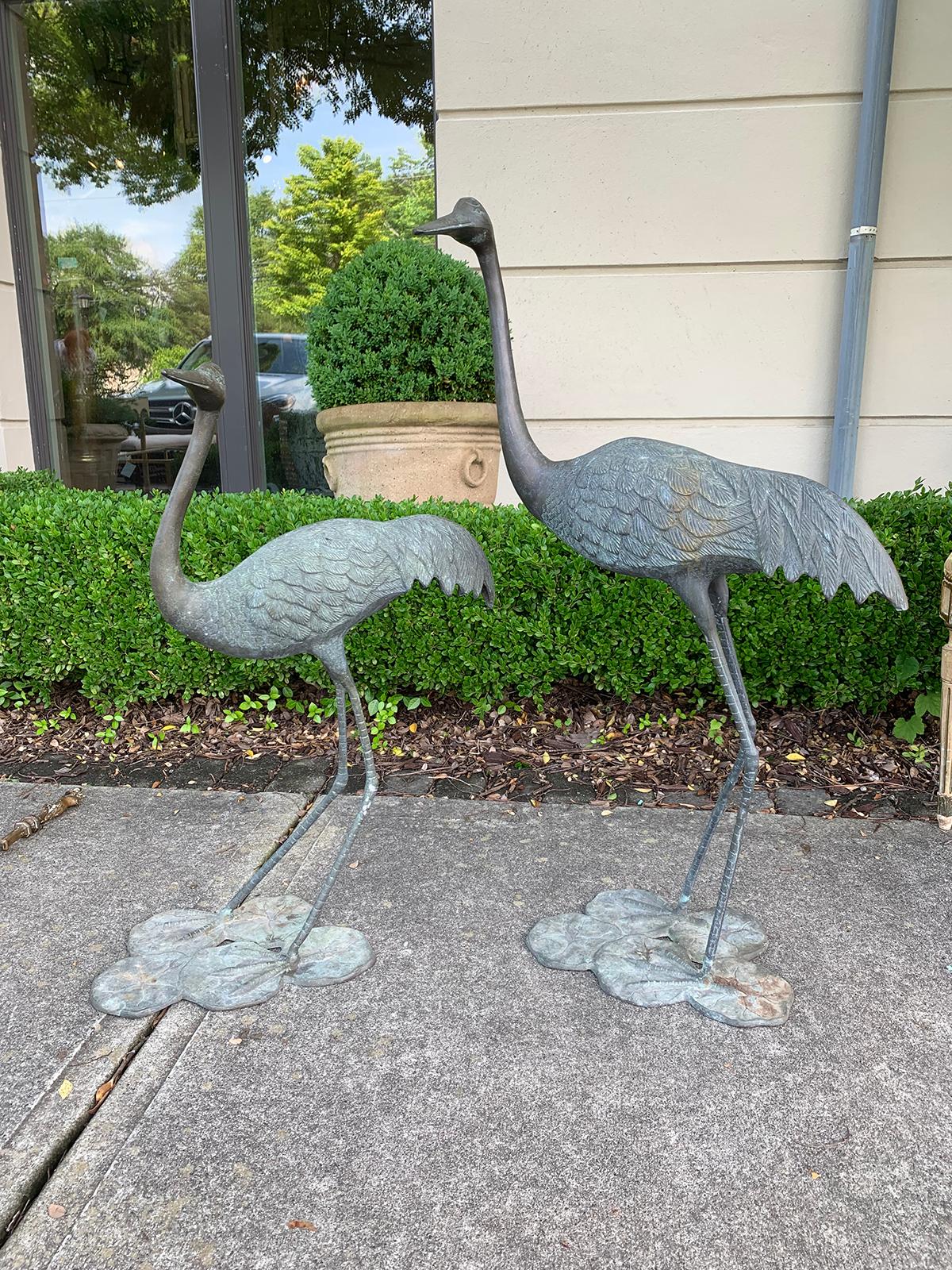 Pair of 20th century bronze herons on lily pads
Taller: 19