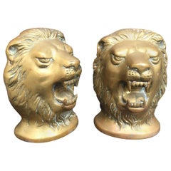 Pair of 20th Century Bronze Lion Head Paperweights